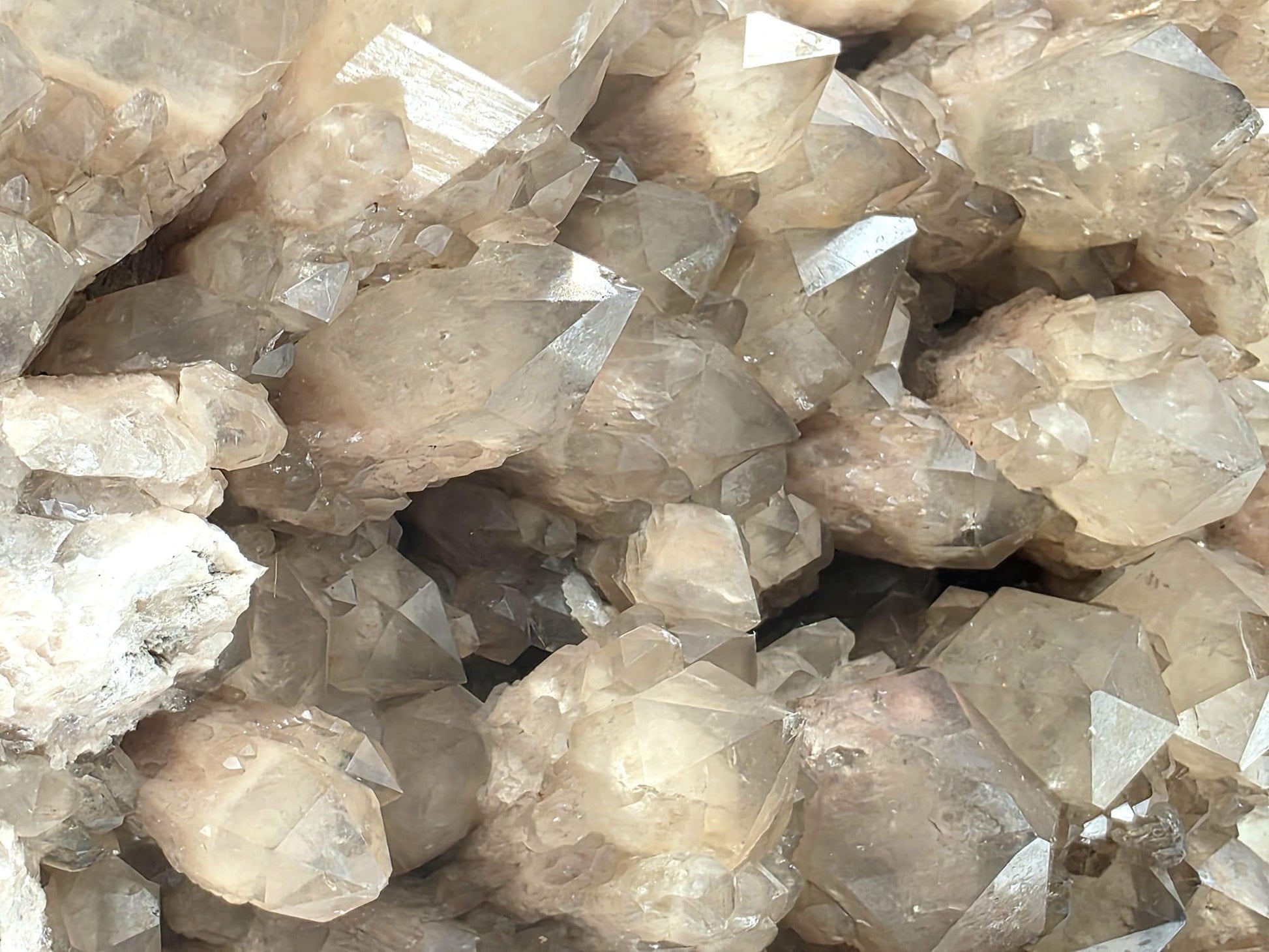 Large natural citrine mineral specimen with polished base