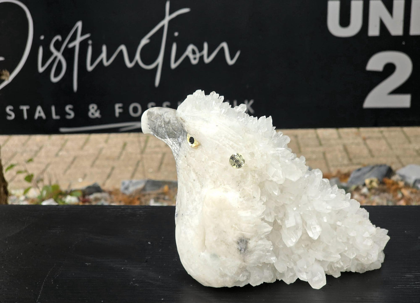 Large clear quartz eagle polished to a brilliant shine.