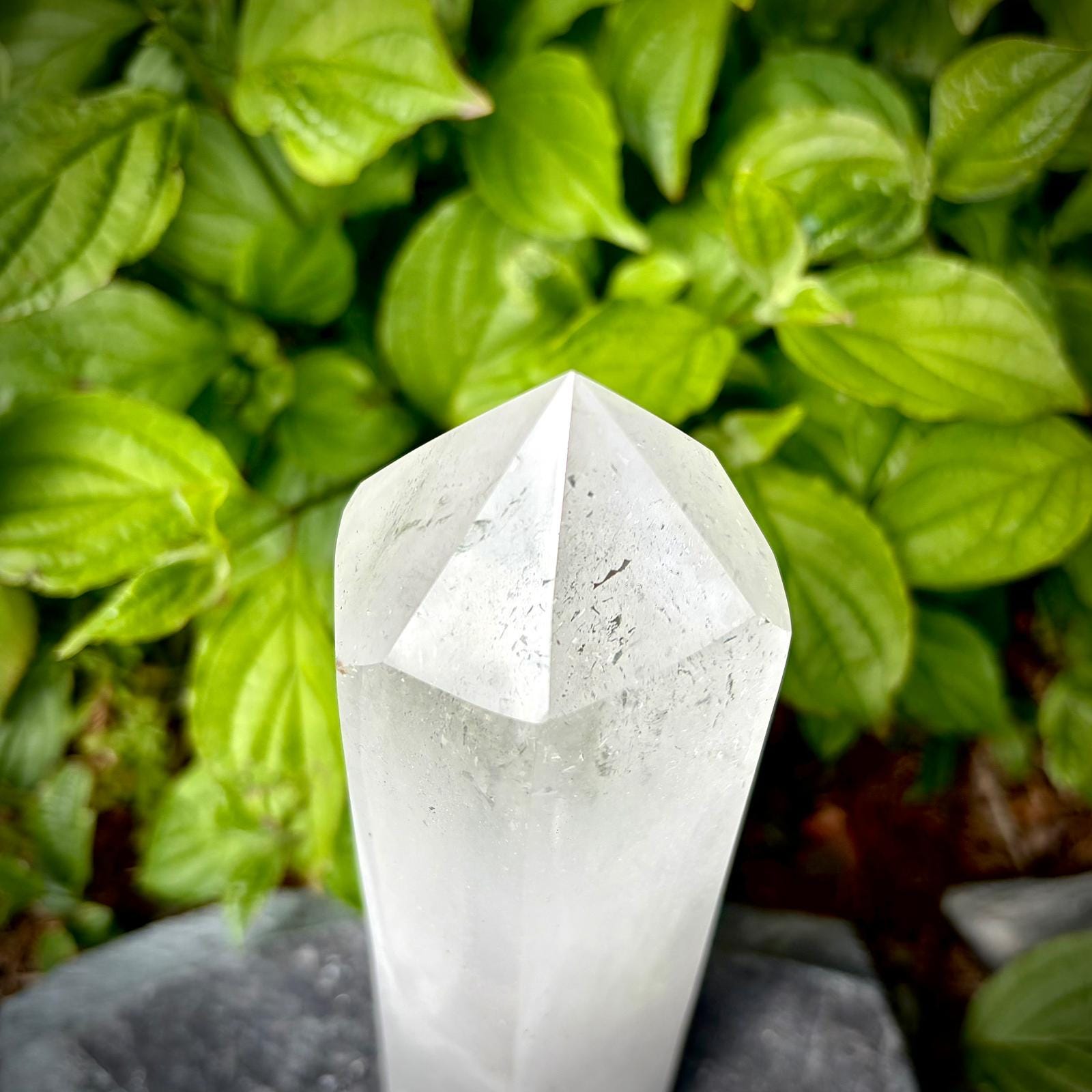 Large clear quartz point for home styling, hand polished into a decorative crystal tower.