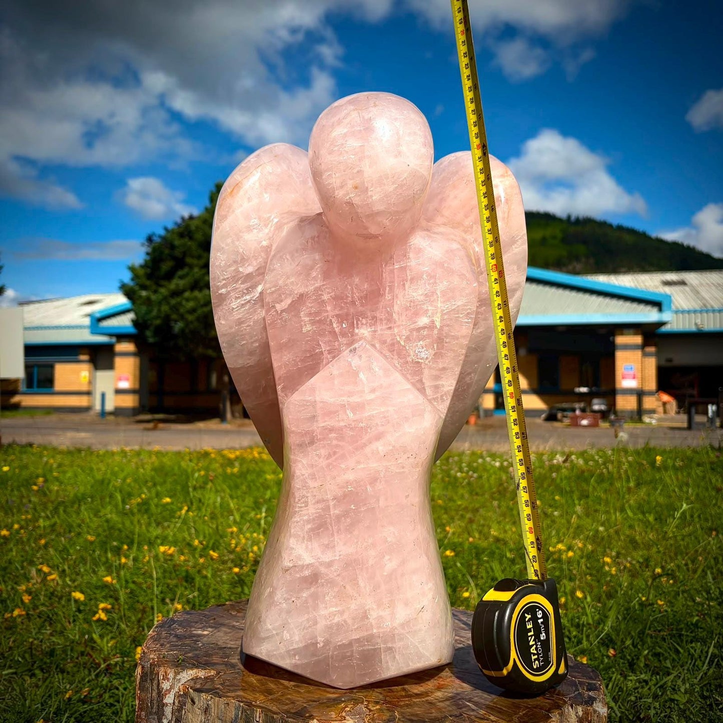 Large crystal angel styled for a soft, elegant and design-led interior setting.