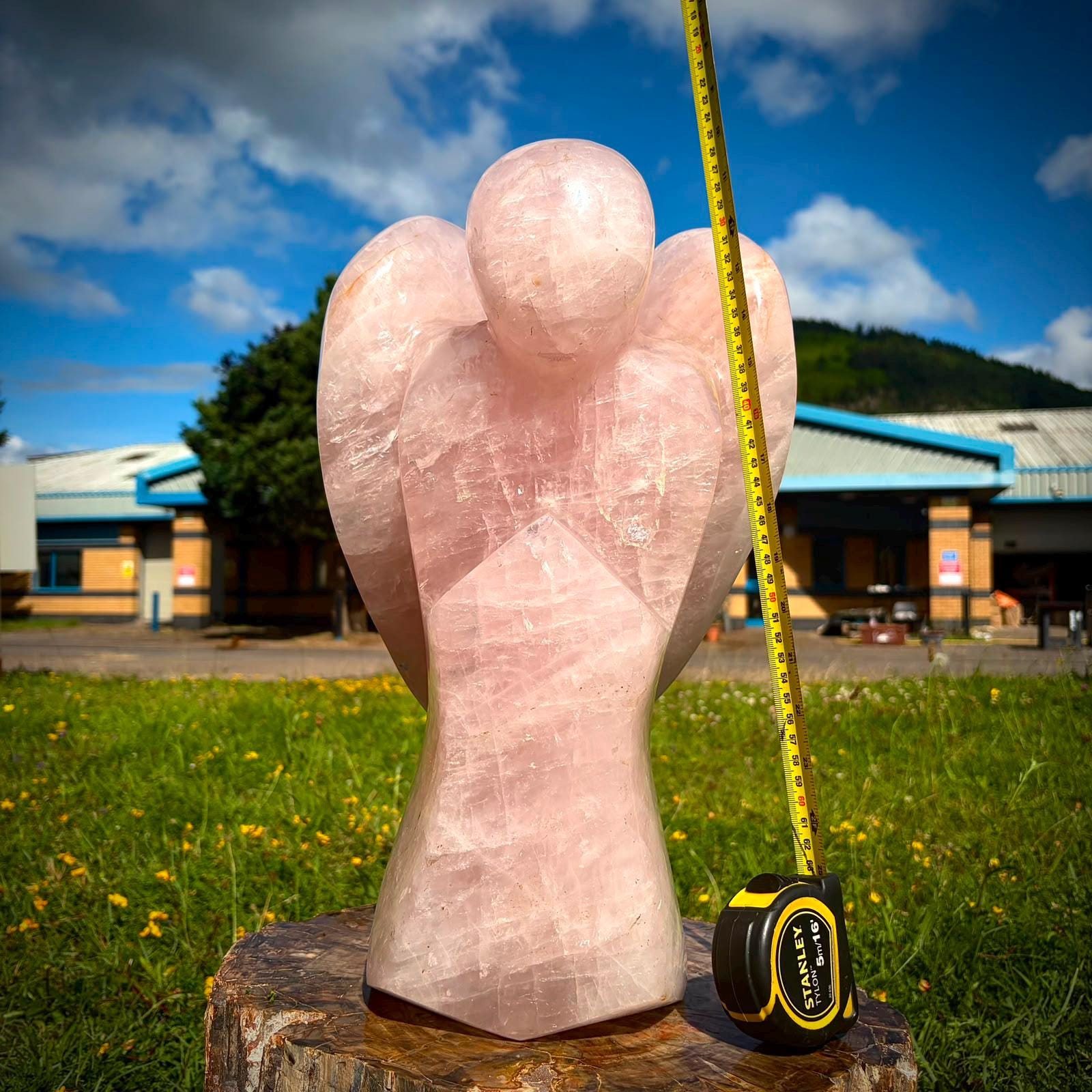 Large crystal angel styled for a soft, elegant and design-led interior setting.