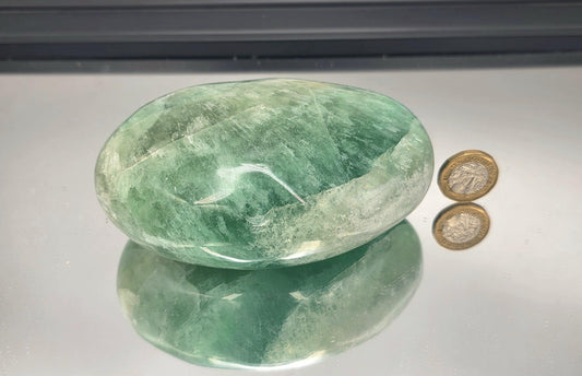 Large fluorite palmstone with smooth finish