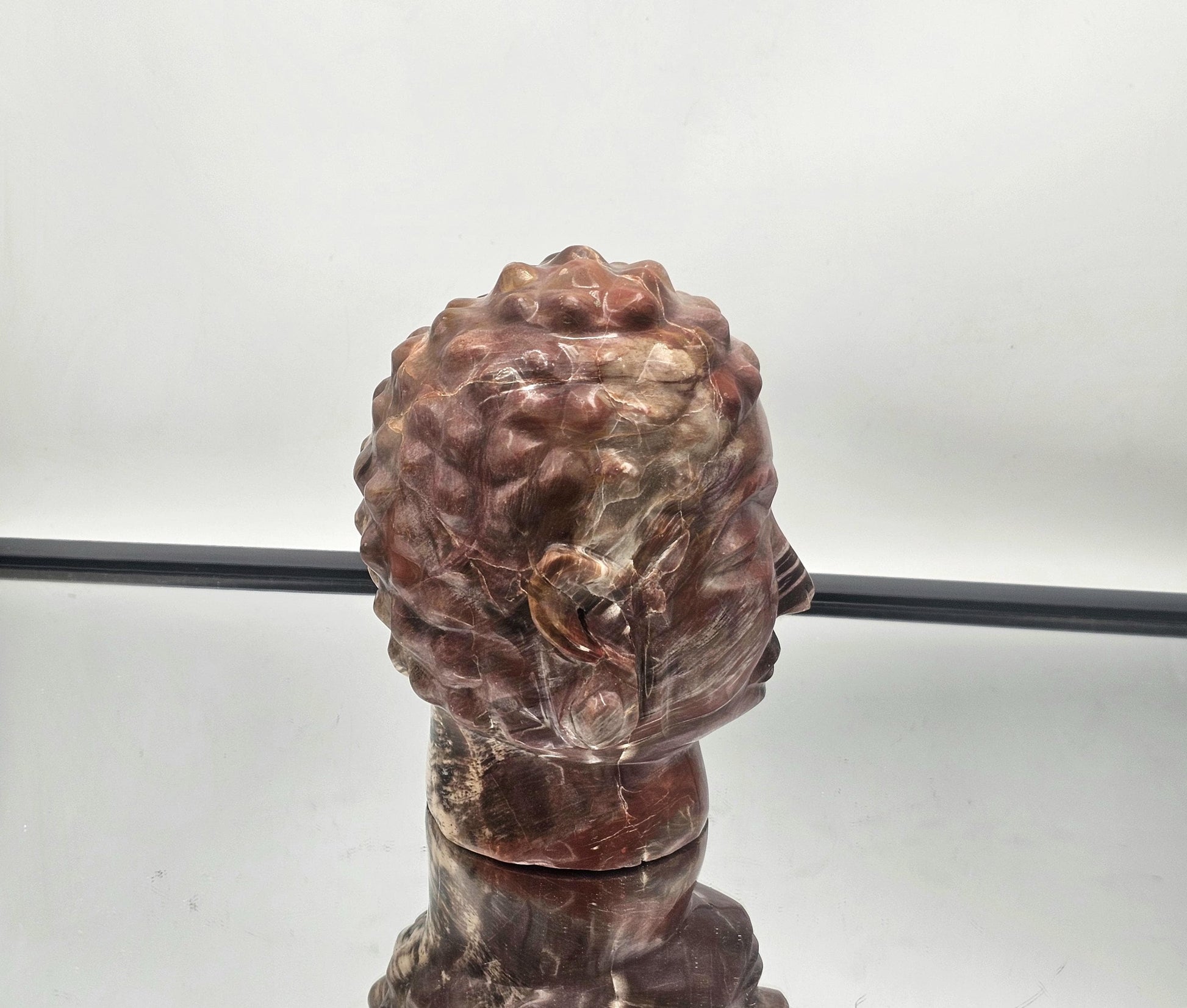 Large hand-carved Fossil Wood Buddha sculpture, perfect as a centerpiece for any collection.