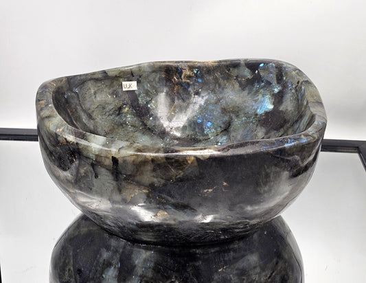 Large Labradorite Crystal Bowl with stunning iridescent flashes, perfect for home décor.