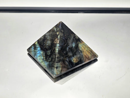 Large Labradorite Crystal Pyramid, hand-carved from Madagascar, perfect for decor.