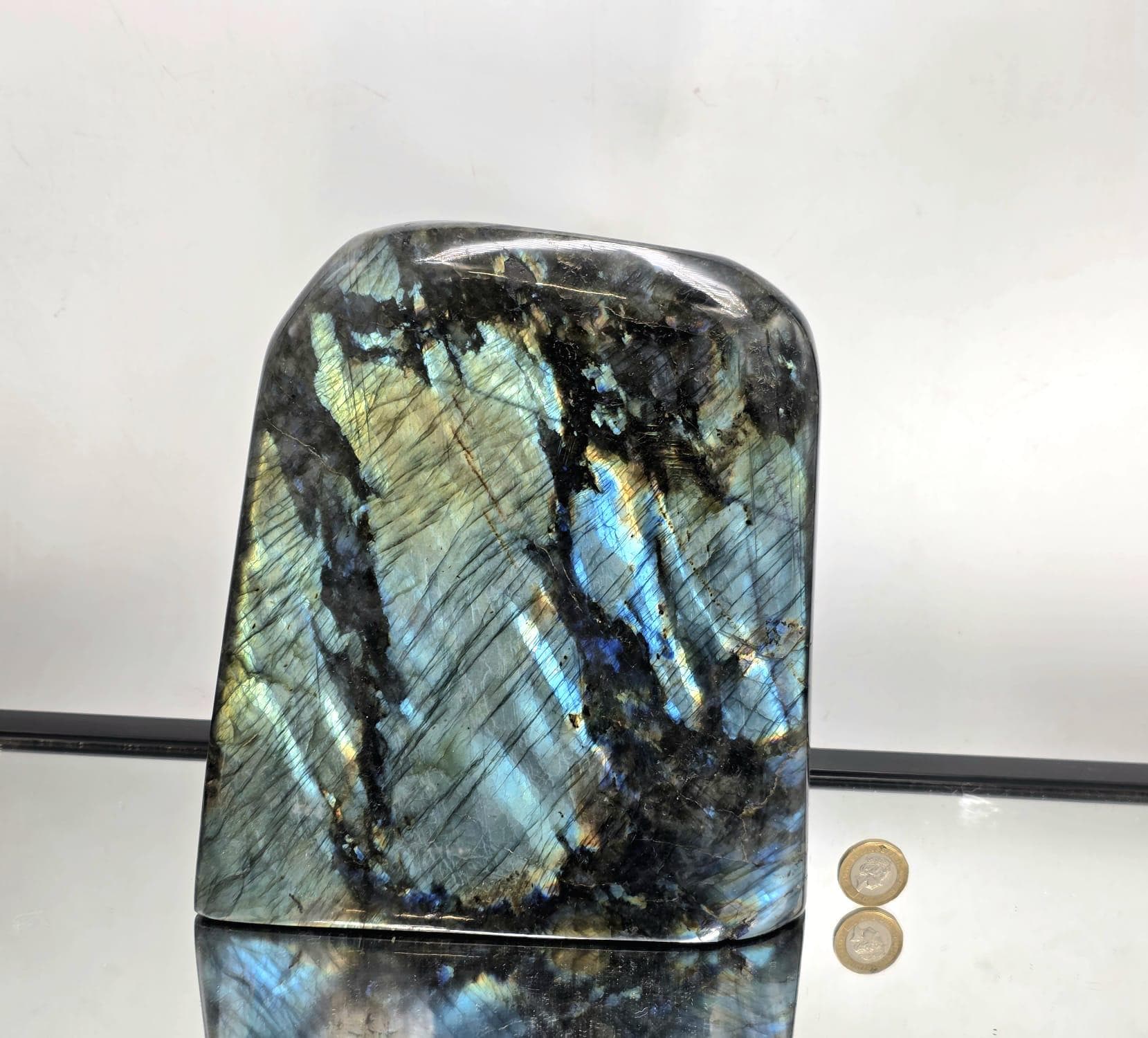 Large polished Labradorite crystal display stone showing bright labradorescence and natural shimmer.