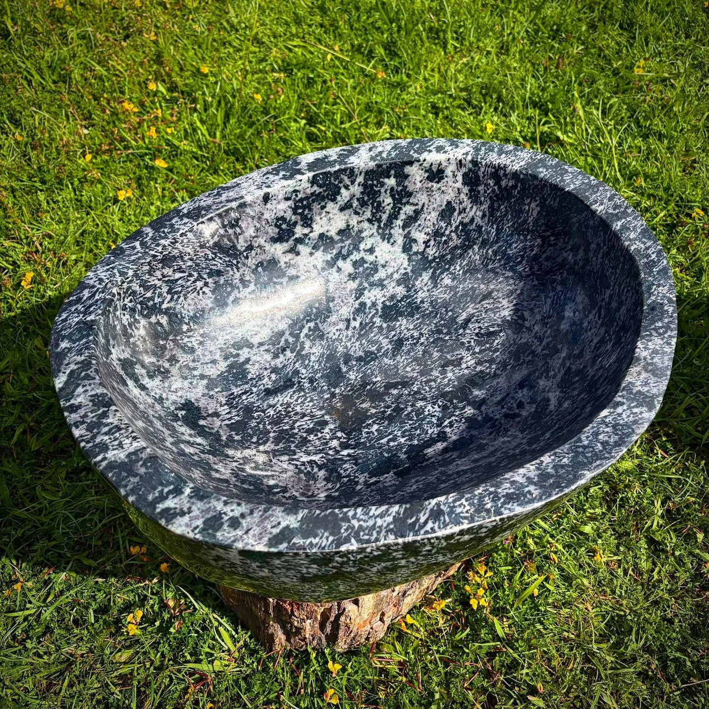 Large hand-carved crystal bowl designed as a luxury feature for refined home interiors.