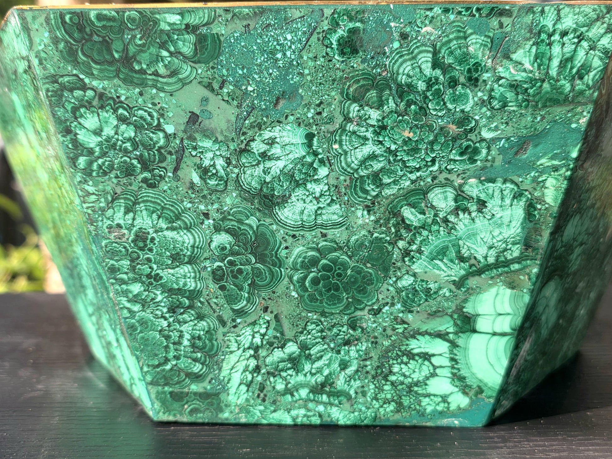 Unique handcrafted malachite flower pot, designed to elevate high-end home décor spaces.