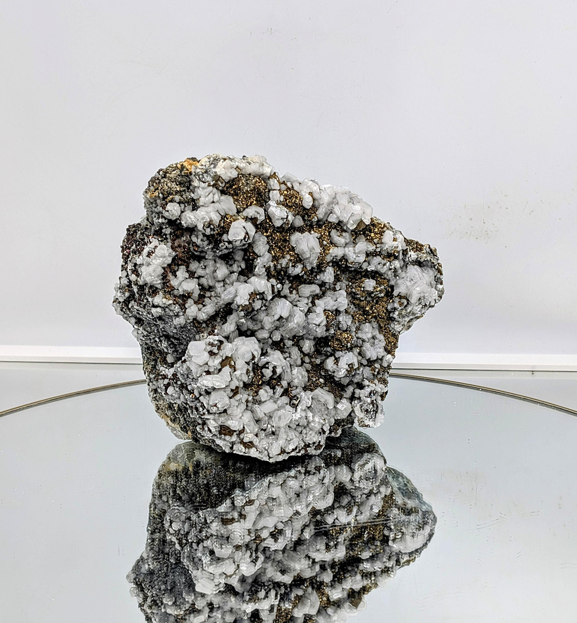 Large mineral display specimen with chalcopyrite and fluorite