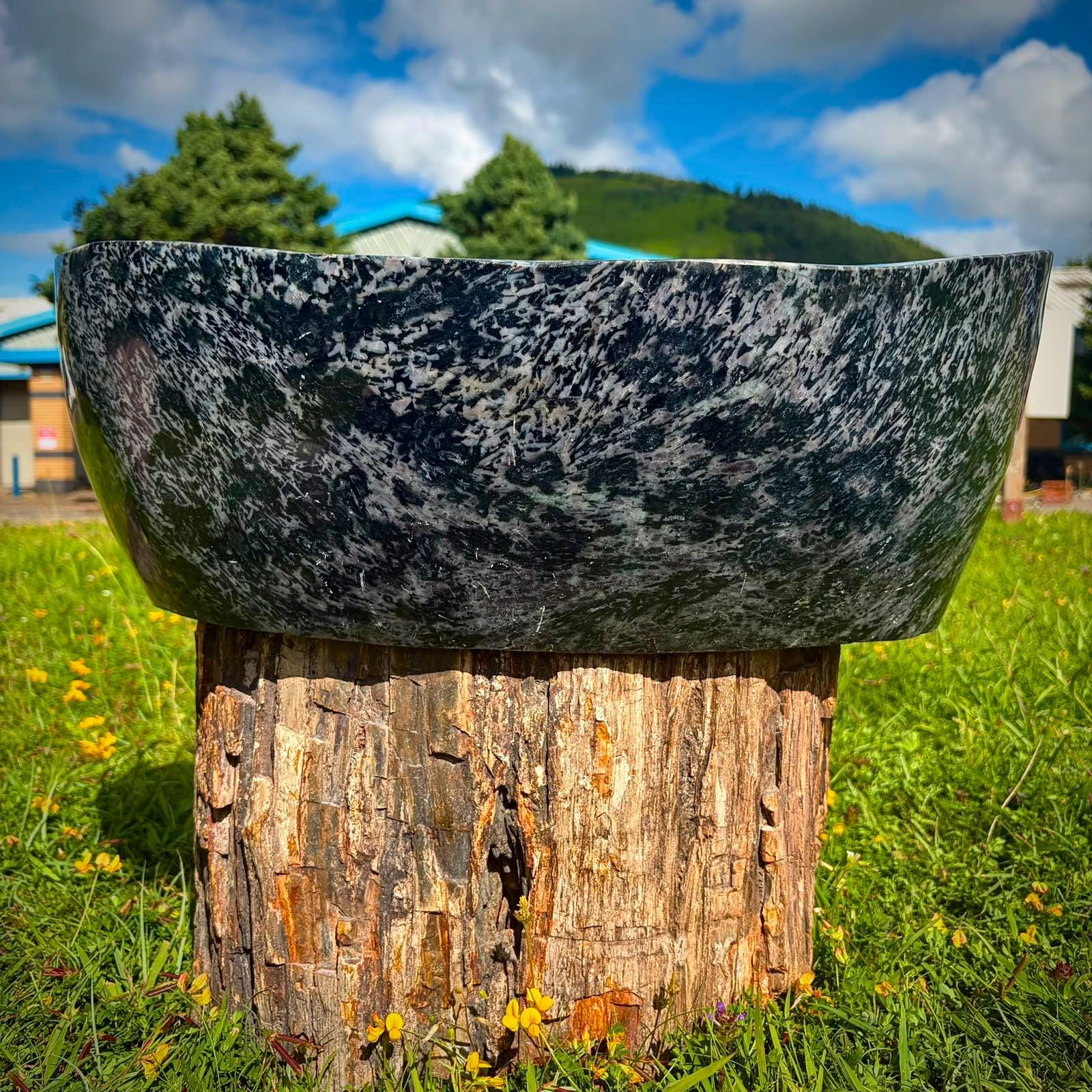 Large 28kg Mystic Merlinite crystal bowl with polished charcoal, indigo and violet mineral tones.