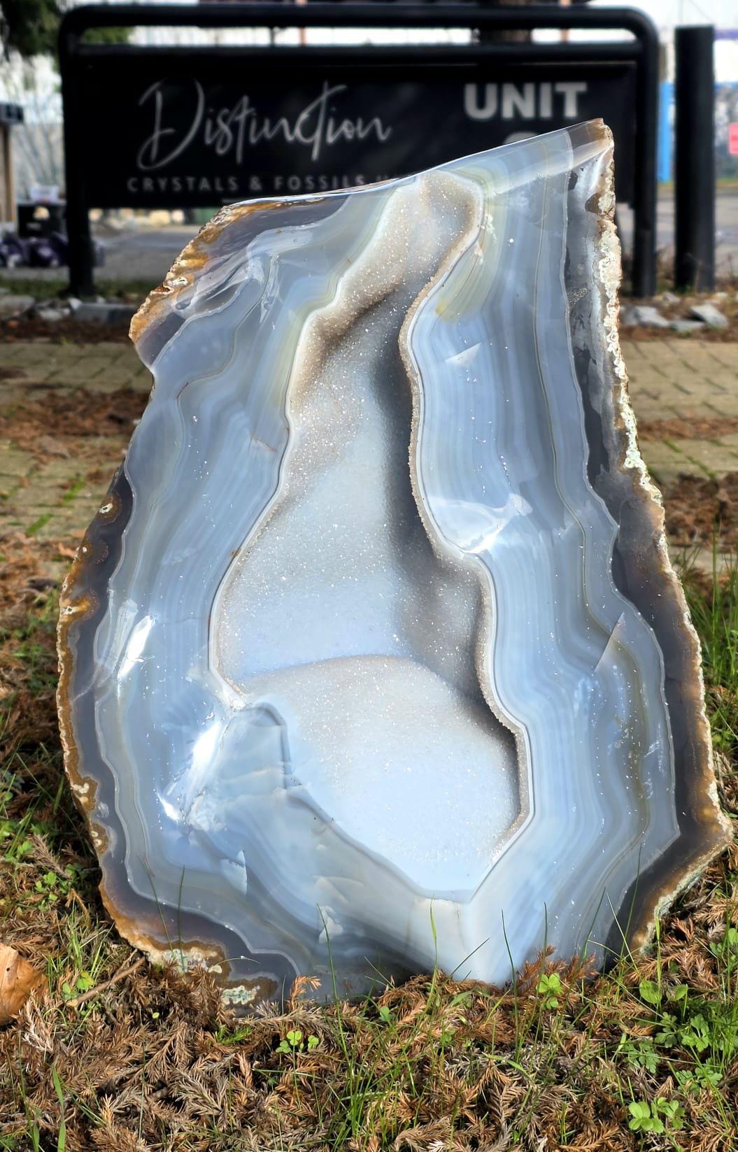 Large natural agate geode from Madagascar with blue banding