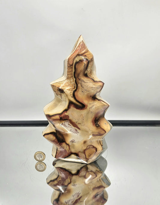 Decorative ocean jasper flame crystal, a stunning focal point for any room.