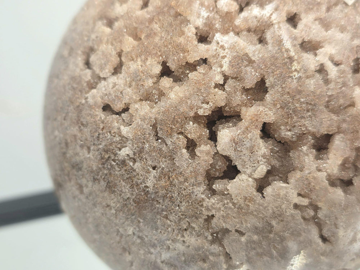 Large Pink Amethyst sphere styled as home décor