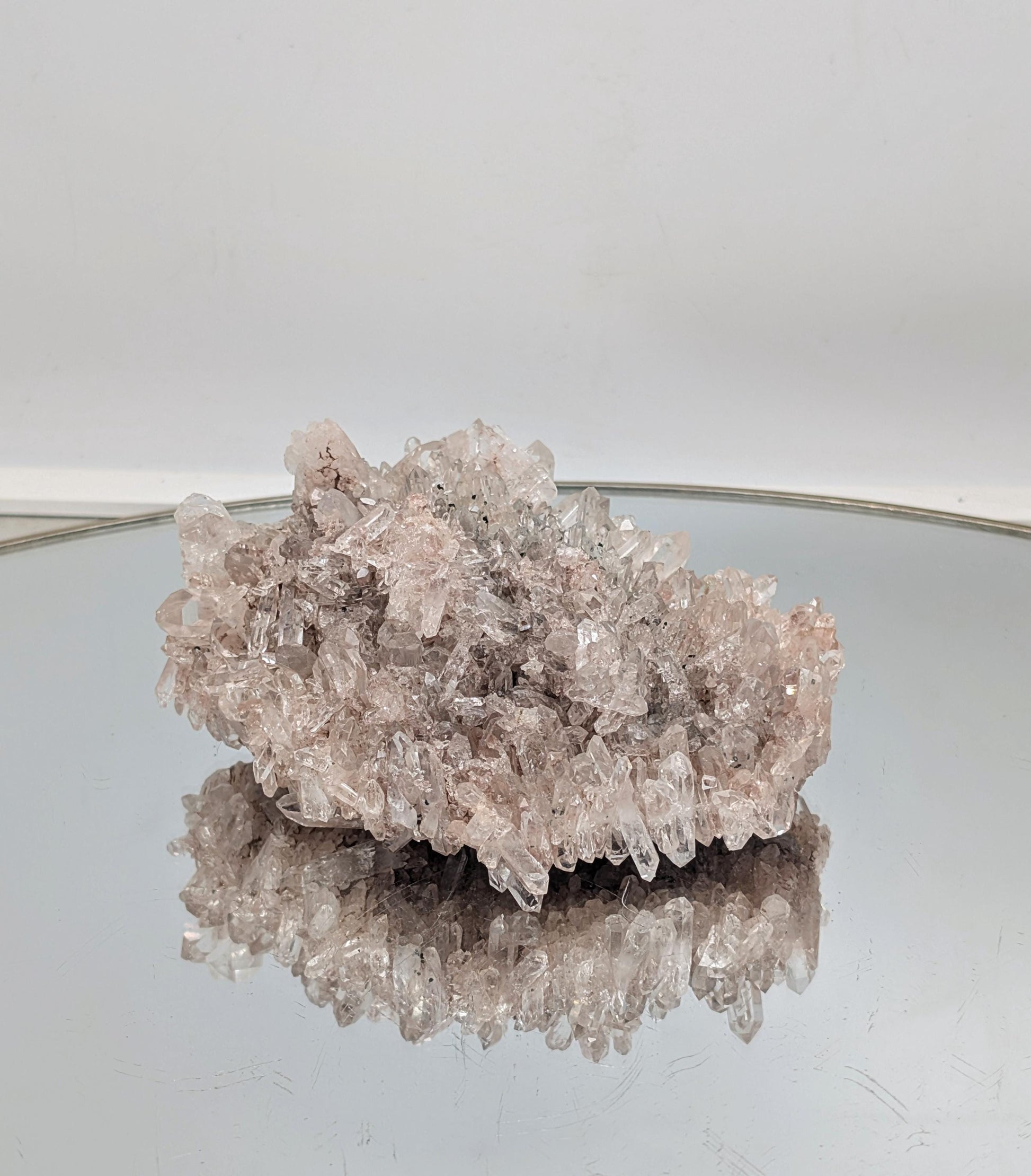 Large pink Colombian clear quartz crystal cluster with exceptional clarity and no damage.