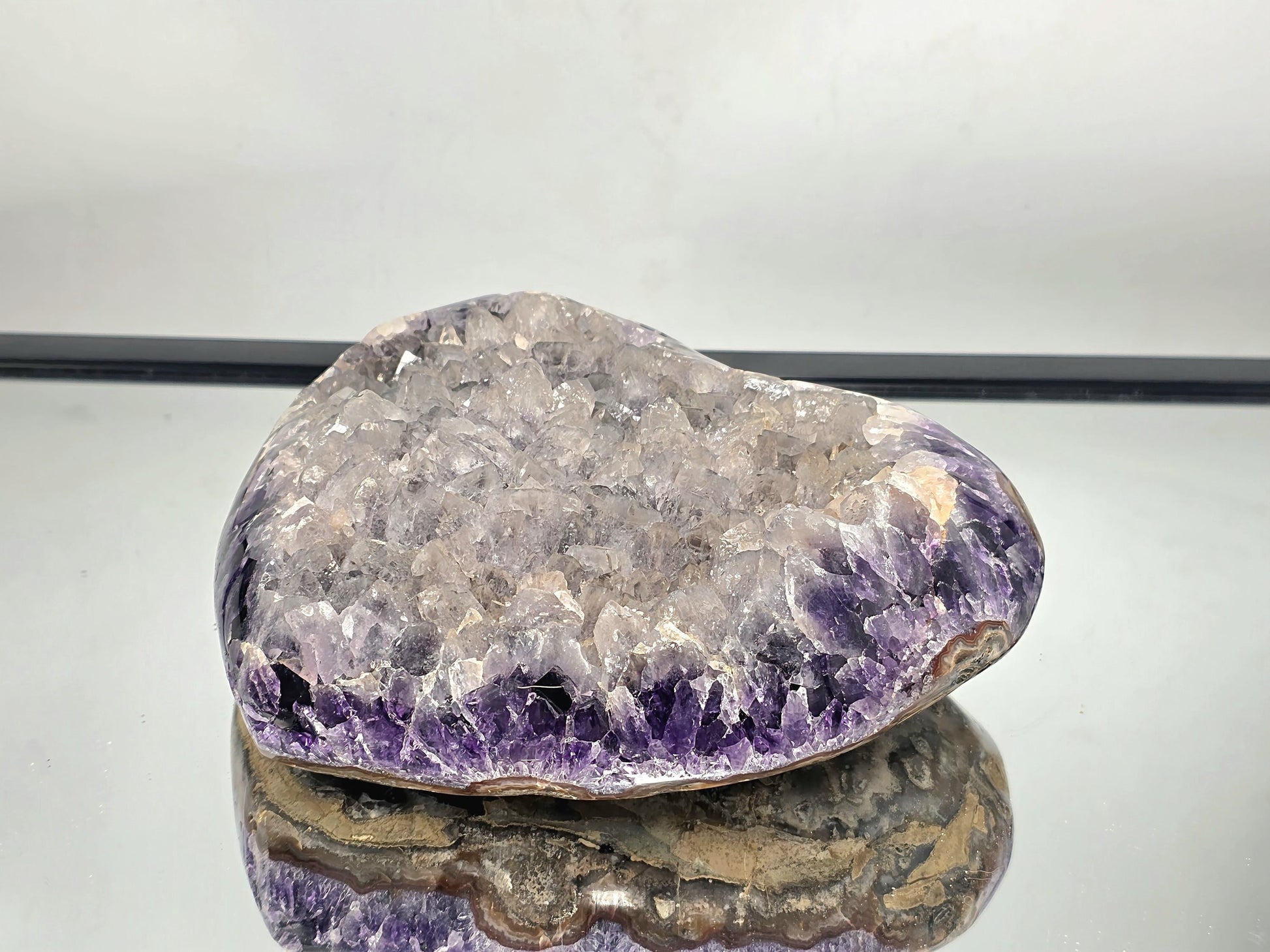 Large polished Amethyst & Quartz Crystal Heart showing natural color blends.