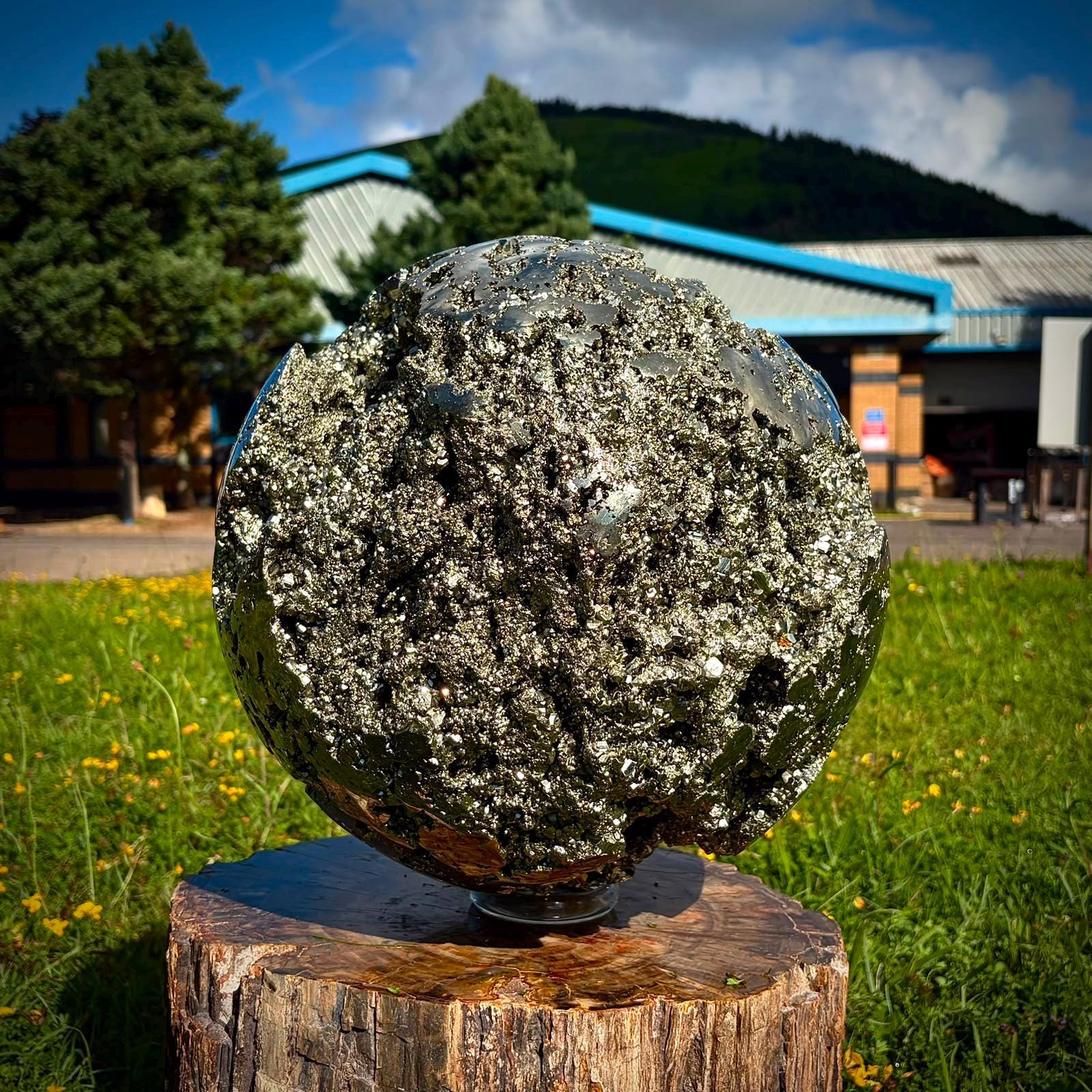 Large Pyrite sphere used in bespoke interior styling with rich metallic texture.