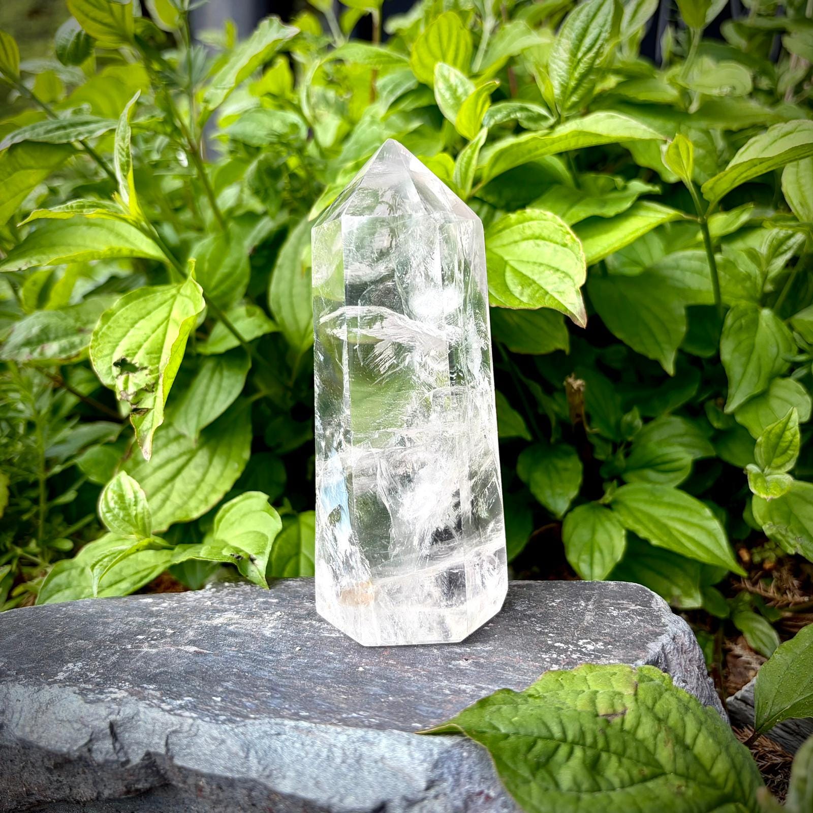 Large quartz crystal interior piece with polished prism shape for natural statement decor.