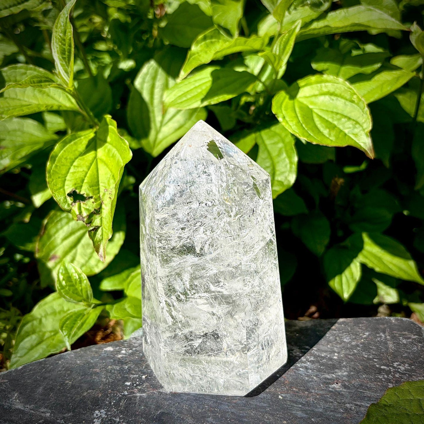Large quartz crystal prism for home decor, hand selected for its polished finish and natural character.