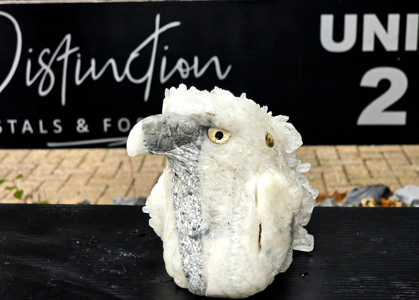 Artisan hand-carved quartz eagle highlighting realistic feathers.