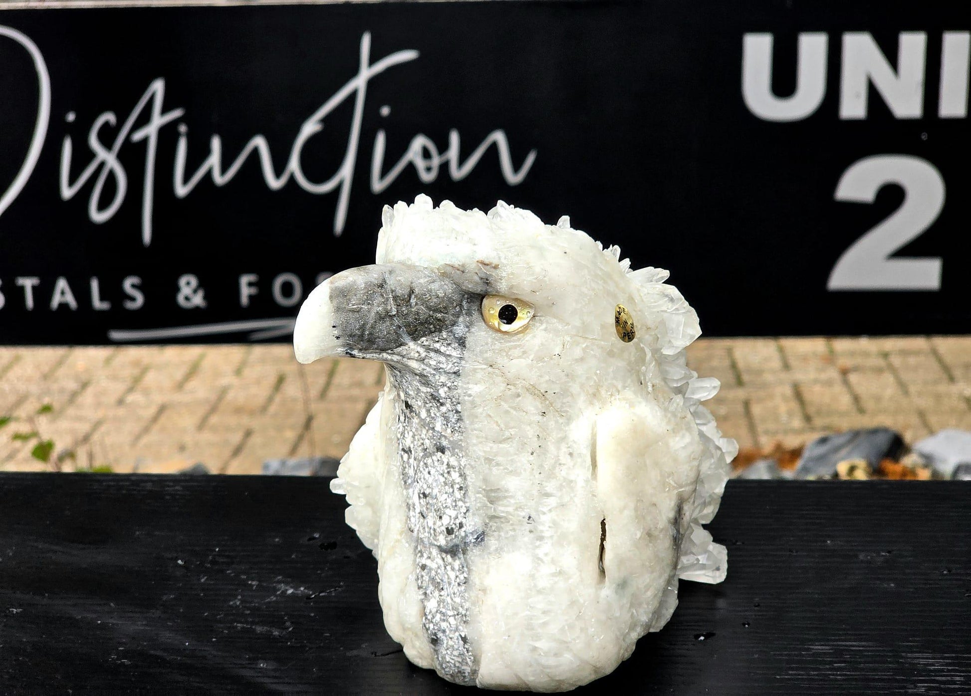 Artisan hand-carved quartz eagle highlighting realistic feathers.