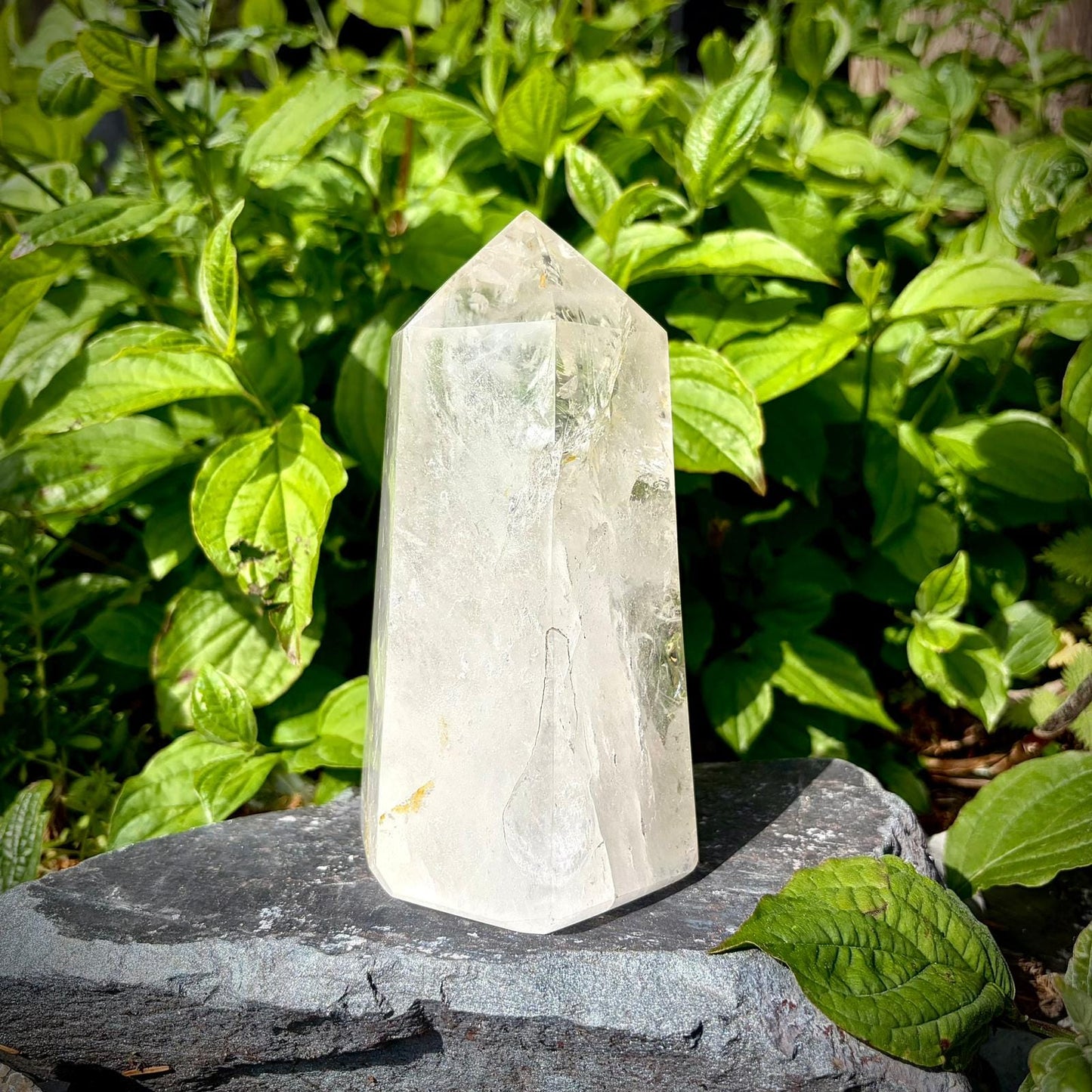 Large quartz point for home decor, polished into a tall crystal tower from Madagascar.