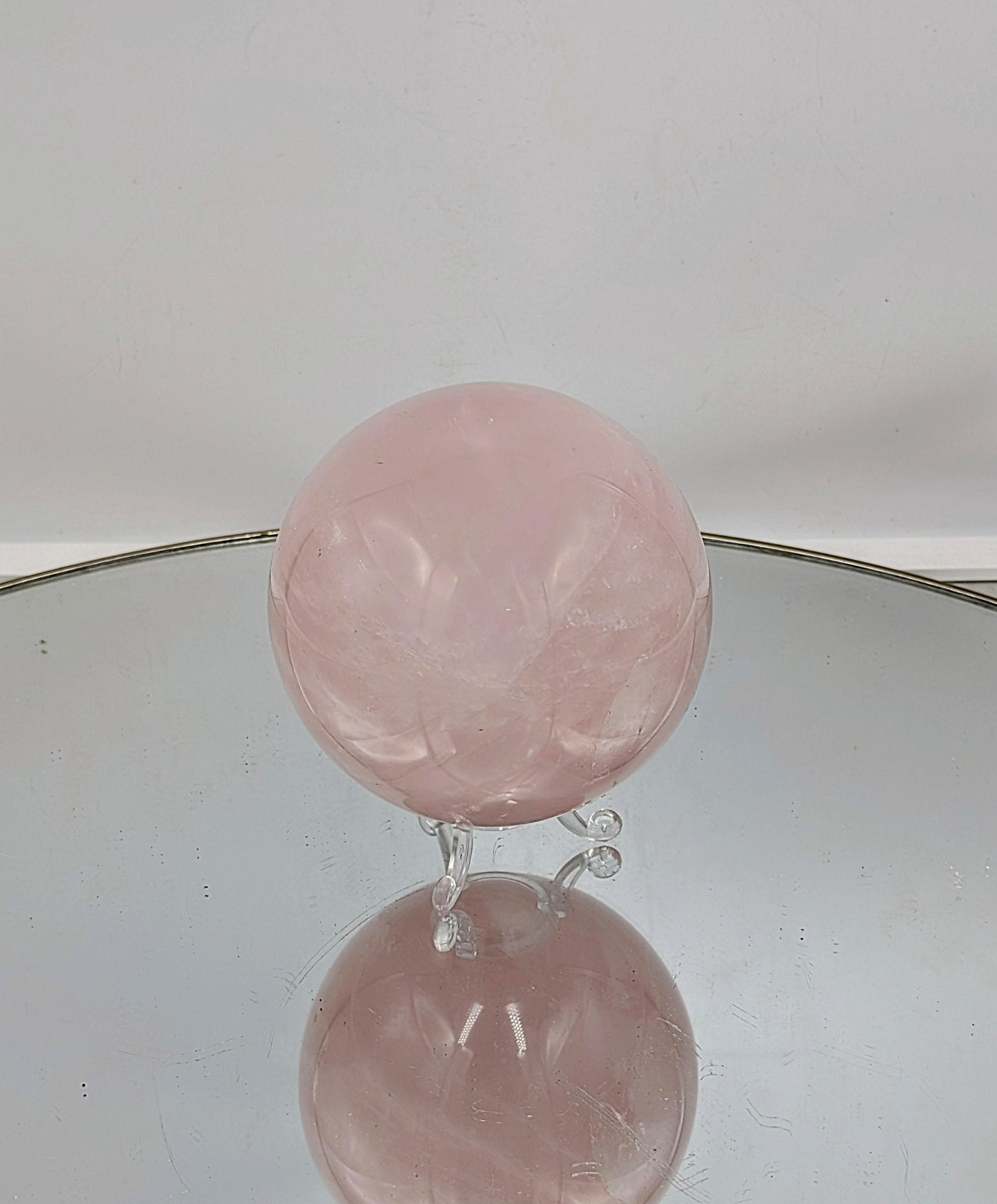 Large rose quartz sphere perfect for home decor

