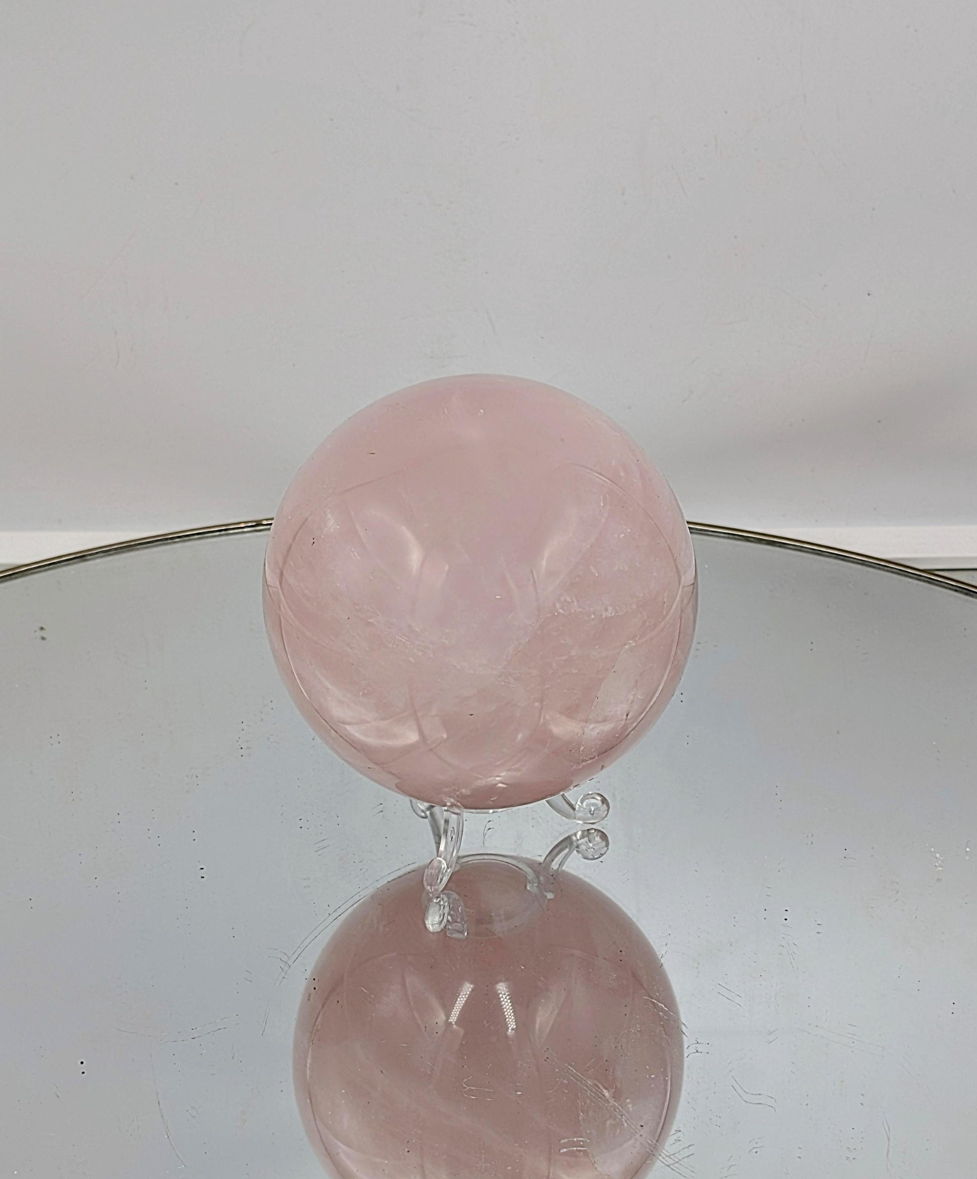 Large rose quartz sphere perfect for home decor
