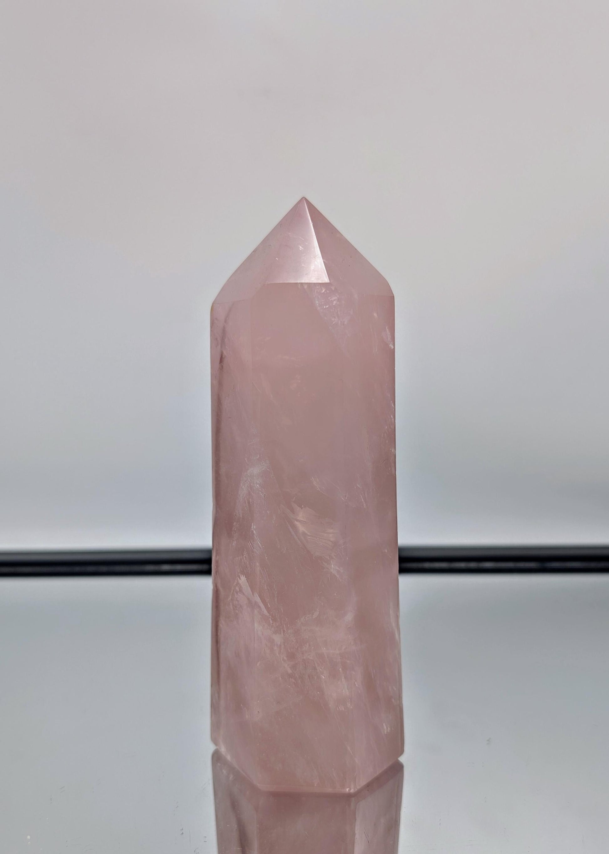 A breathtaking large rose quartz prism, handcrafted in Madagascar for home décor.