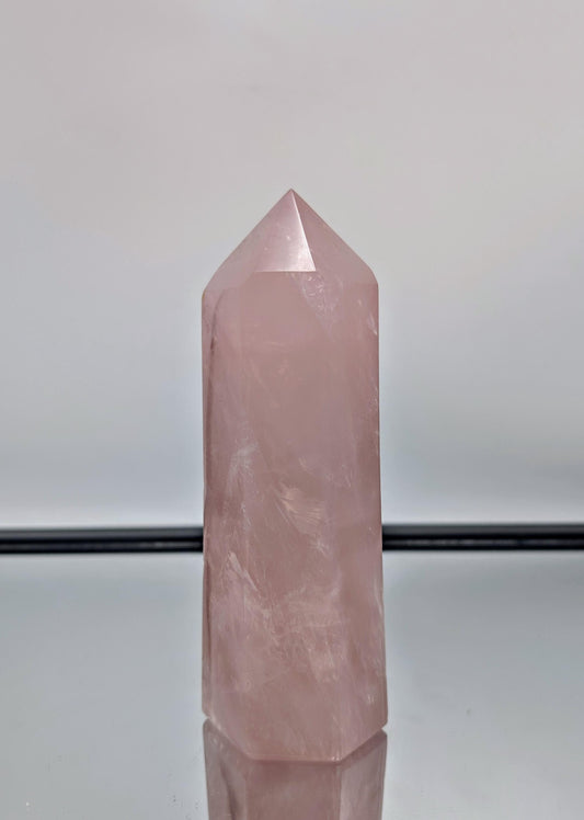A breathtaking large rose quartz prism, handcrafted in Madagascar for home décor.