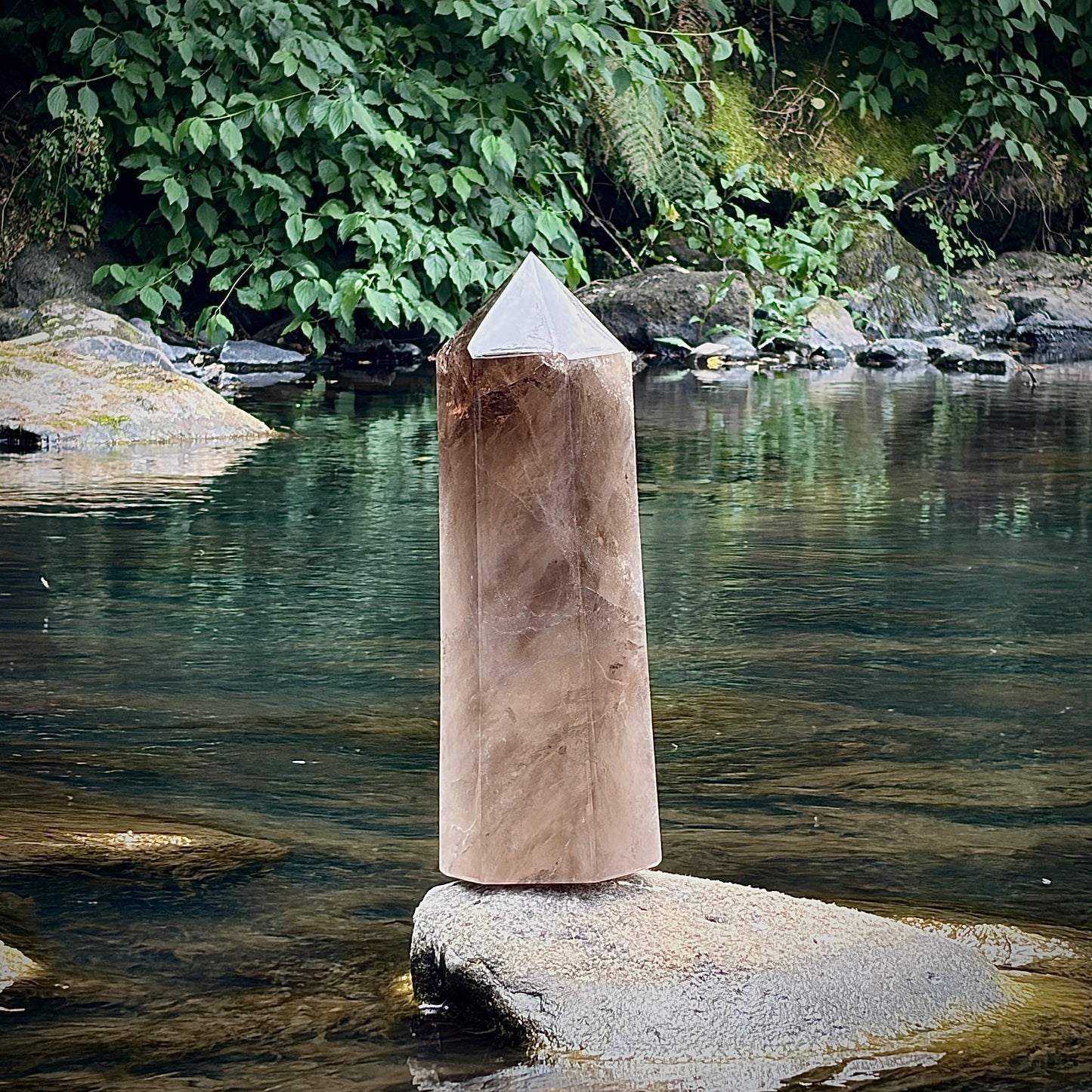 Rear view of the one-of-a-kind Smoky Quartz tower showcasing its natural structure.