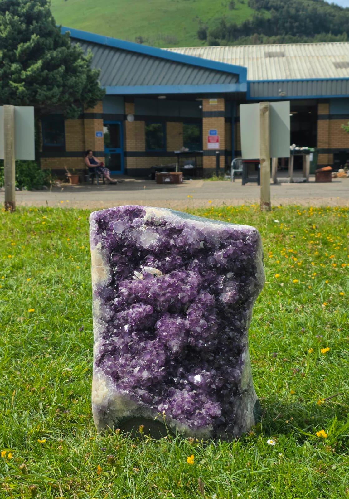 Large natural Uruguayan Amethyst crystal weighing 37.85kg with freestanding display shape