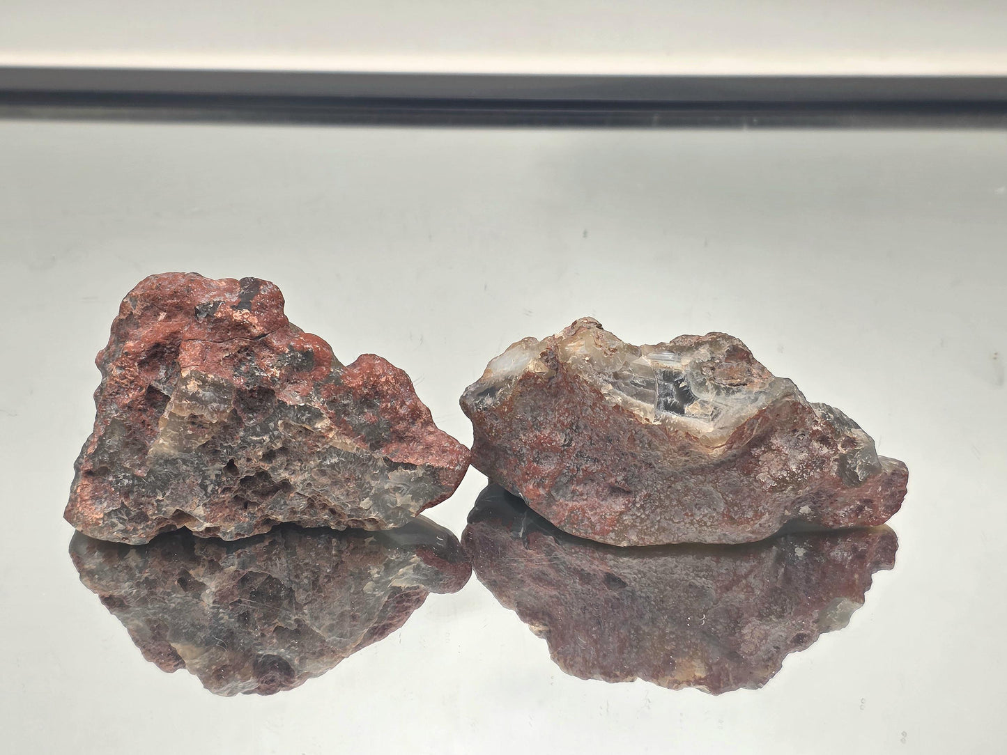 a large pair of polished malawi banded agate crystals