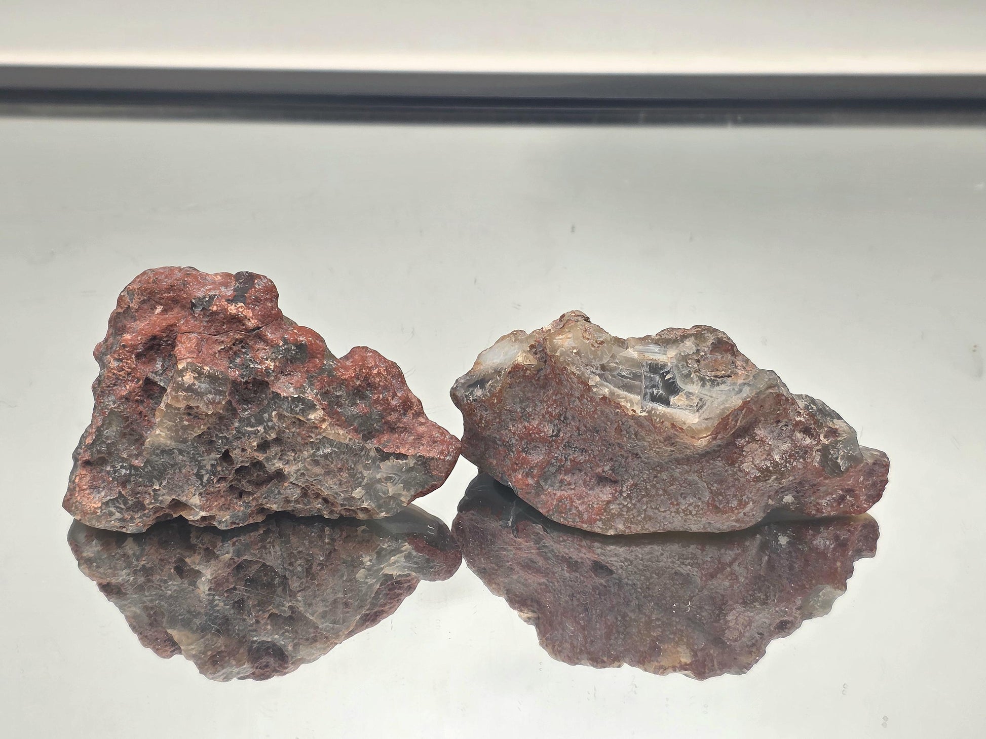 a large pair of polished malawi banded agate crystals