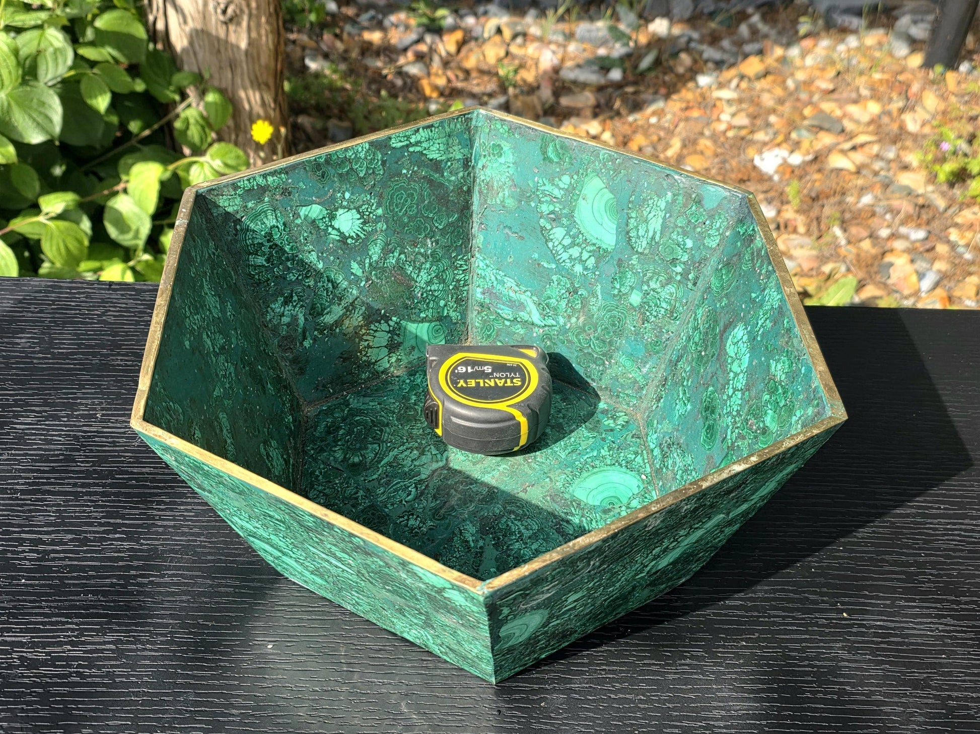 Sophisticated malachite flower pot, adding a touch of natural elegance to upscale interiors.