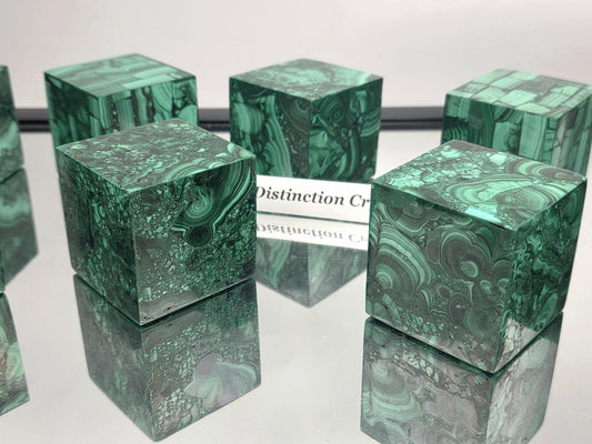 Hand-polished large Malachite cube with deep green banding for luxury décor.