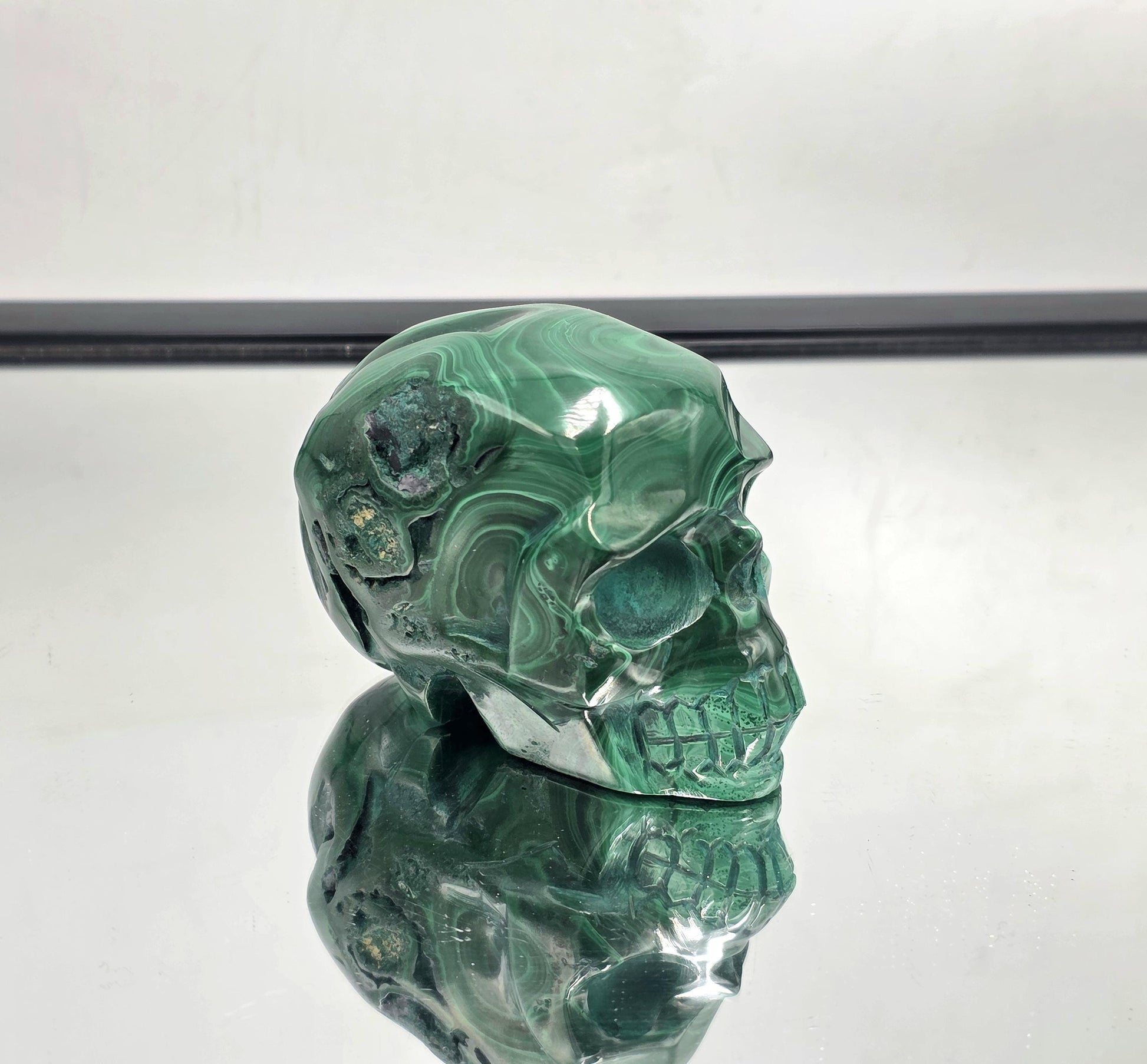 Hand-carved Malachite skull for collectors and luxury décor.