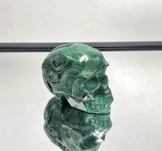 Hand-carved Malachite skull for collectors and luxury décor.