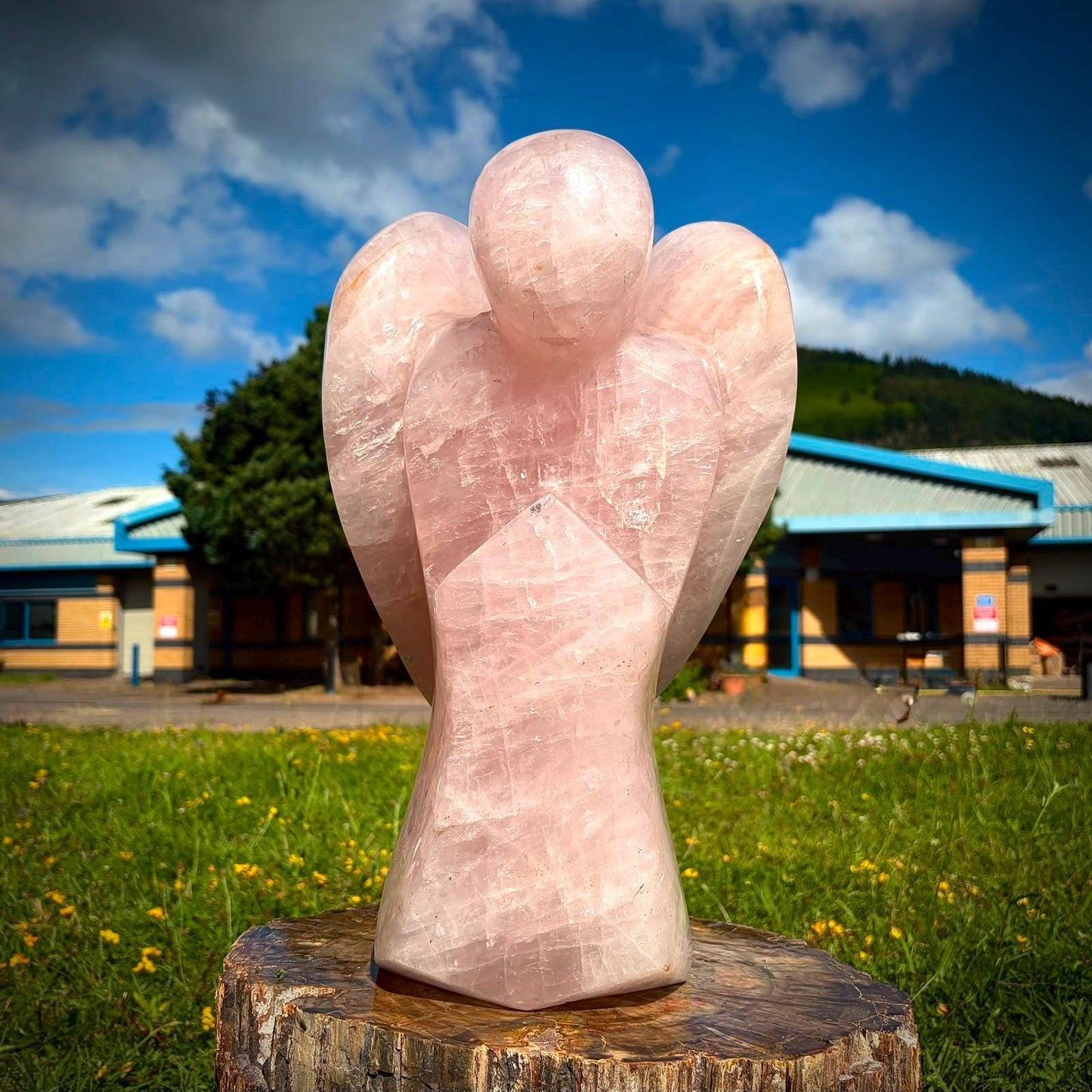 Luxury pink crystal angel sculpture with a polished finish and soft natural colour.