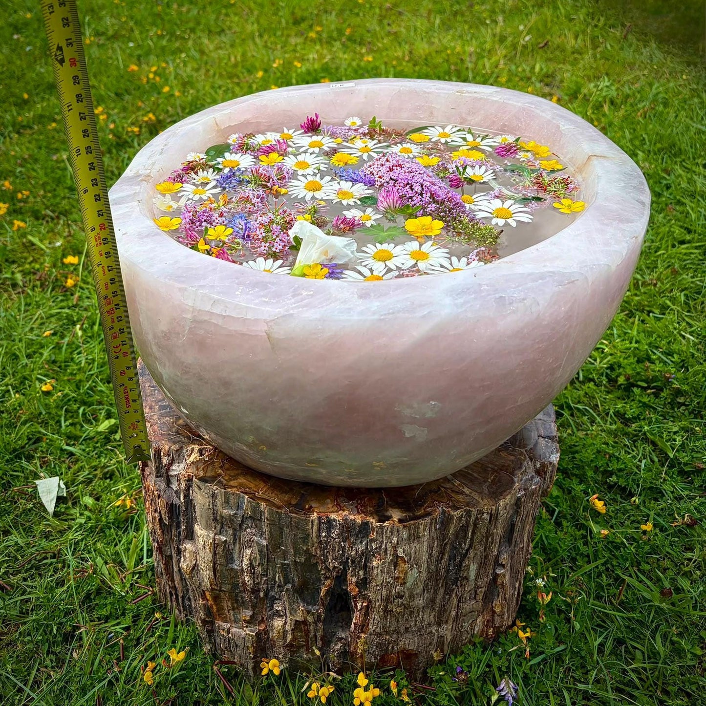 Polished pink Quartz bowl with natural internal veining for elevated interior styling.