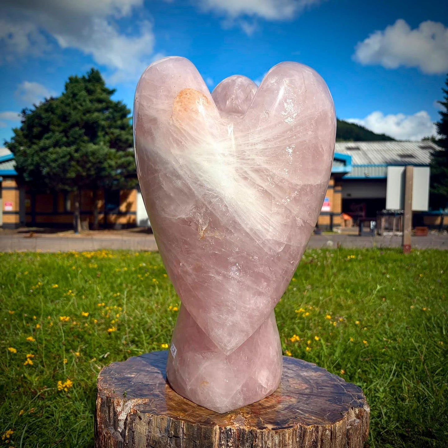 Large Rose Quartz angel used as a refined natural stone feature for luxury home décor.