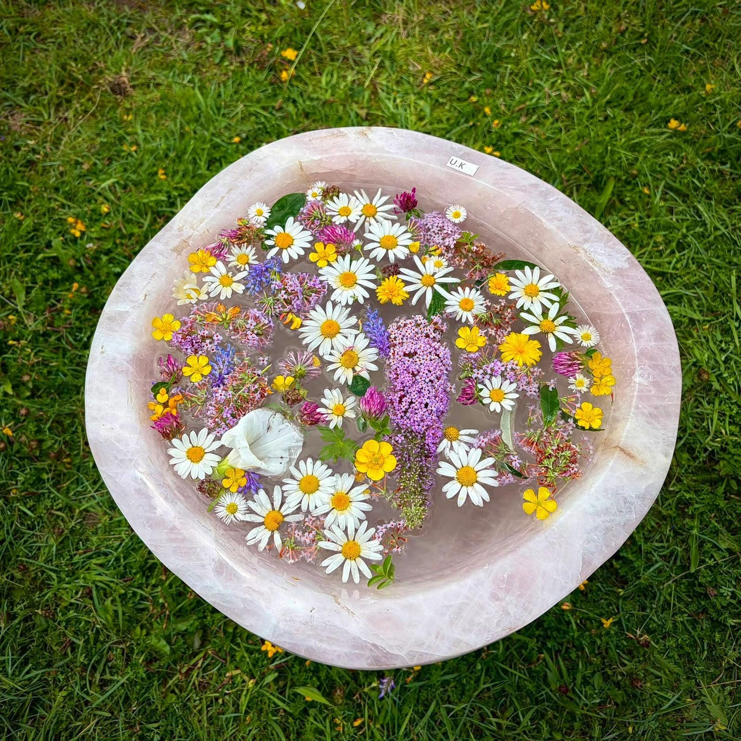 Front view of a luxury Madagascan Rose Quartz bowl with a smooth hand-polished finish.