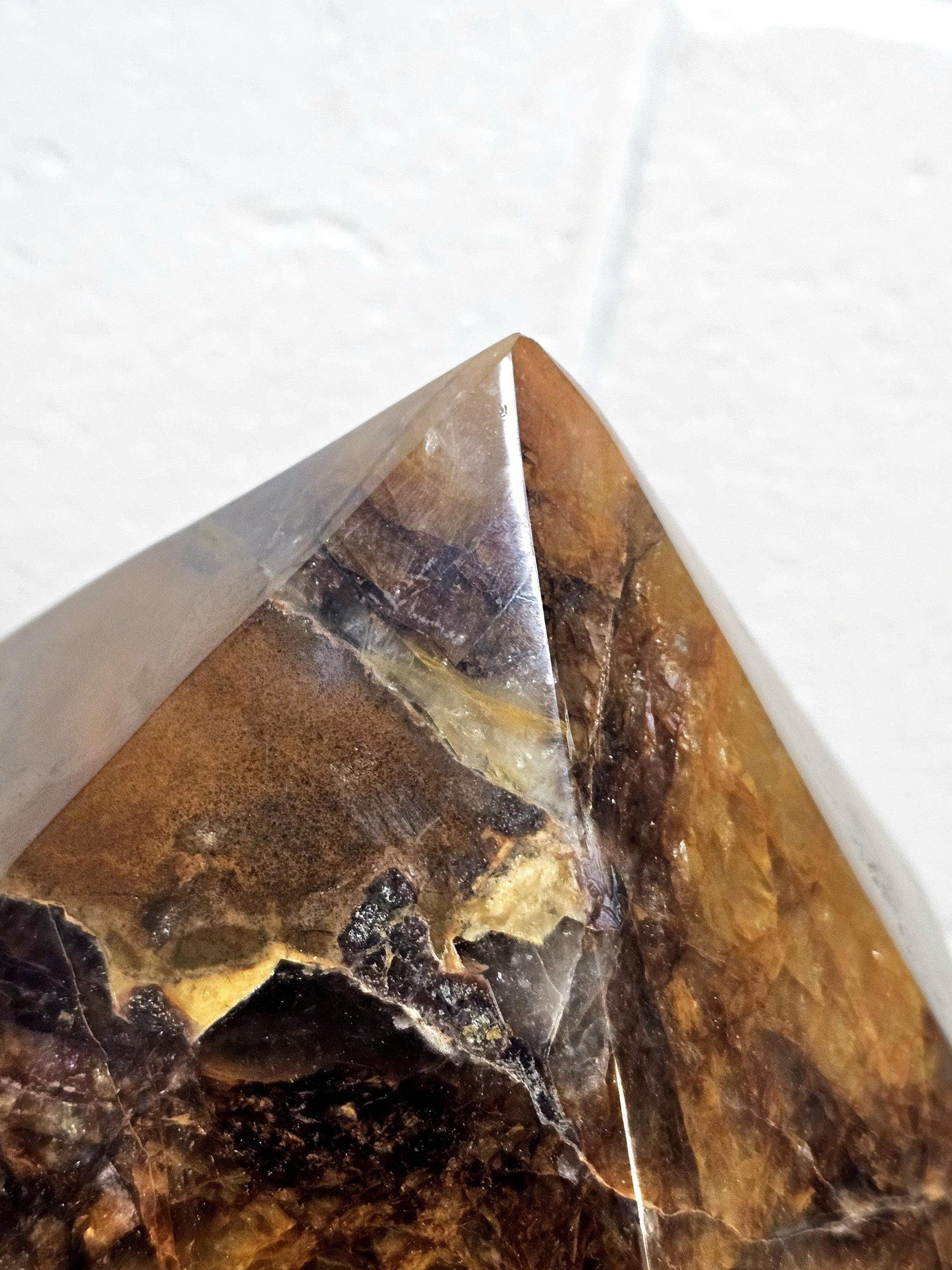 Luxury Yellow Hematoid Crystal Prism, perfect for holistic interiors.