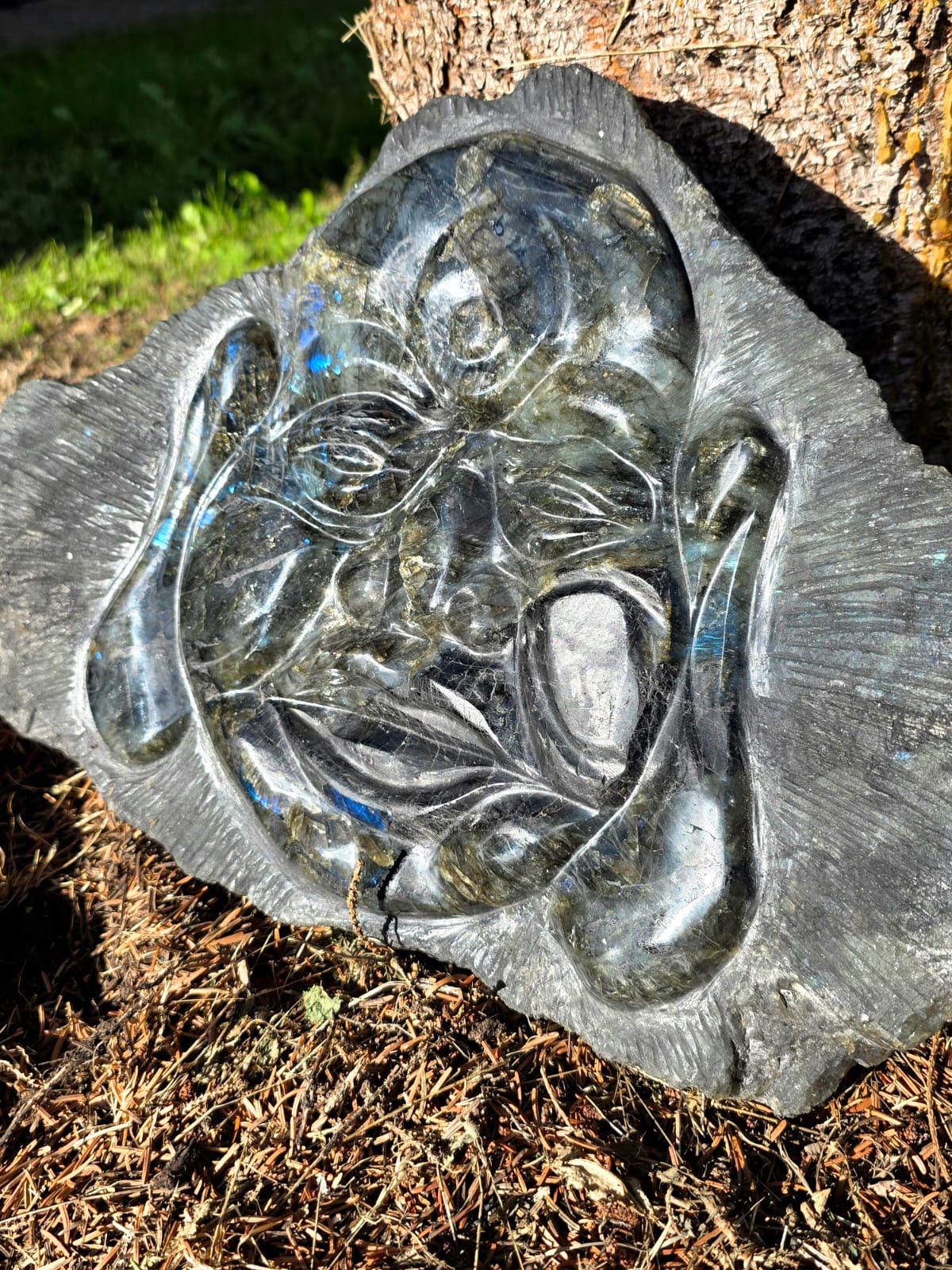 Hand carved Madagascan Labradorite Buddha sculpture with natural labradorescence