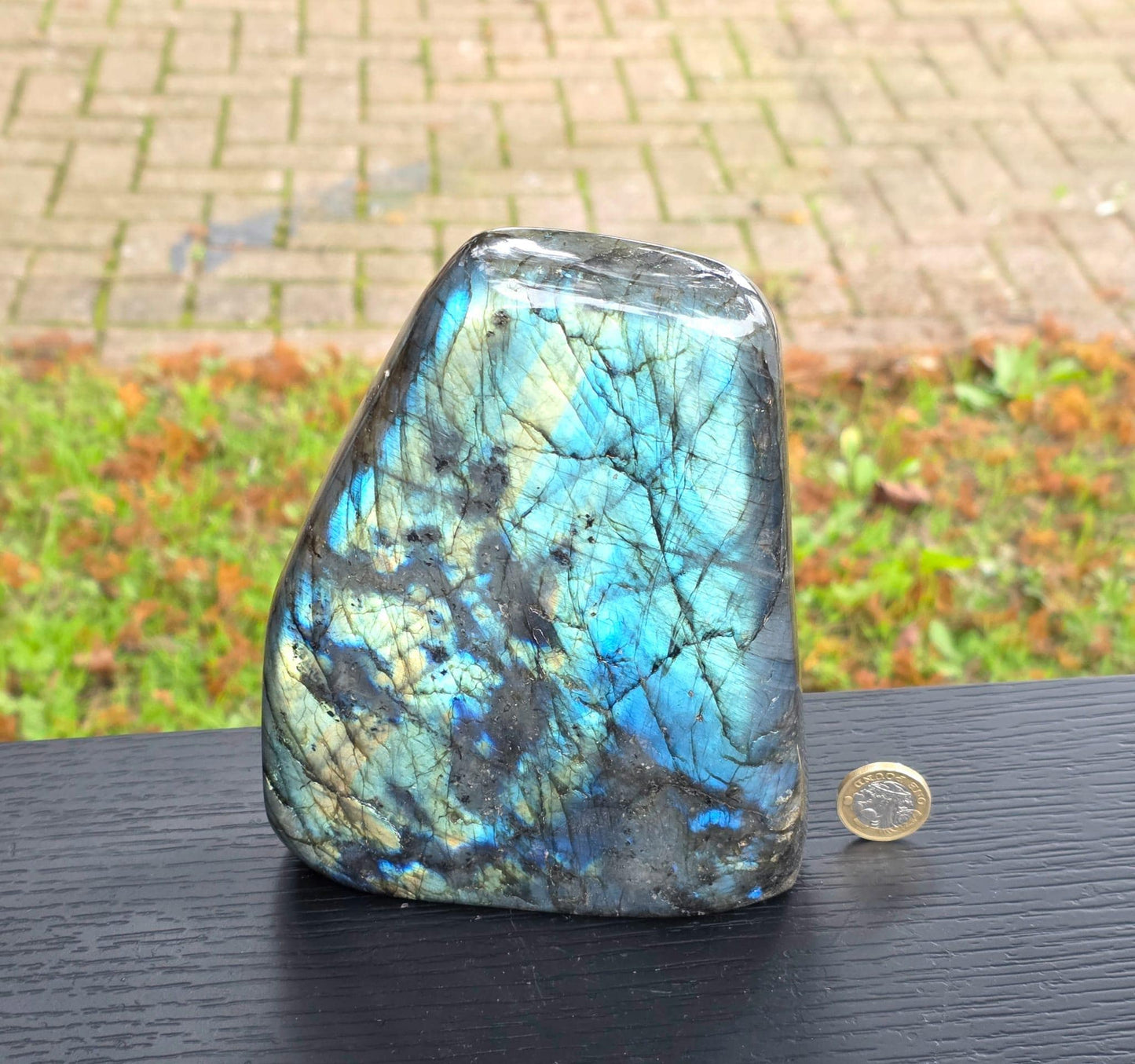 Authentic Madagascan labradorite crystal with visible banding and color play.