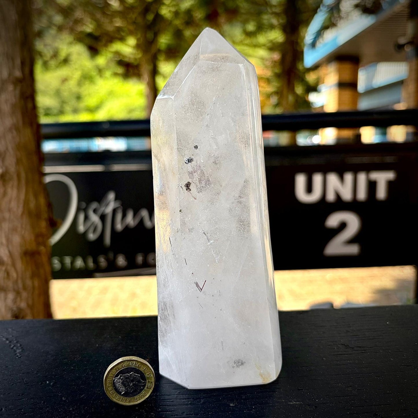 Madagascar quartz prism crystal decor piece with polished surfaces and natural internal texture.