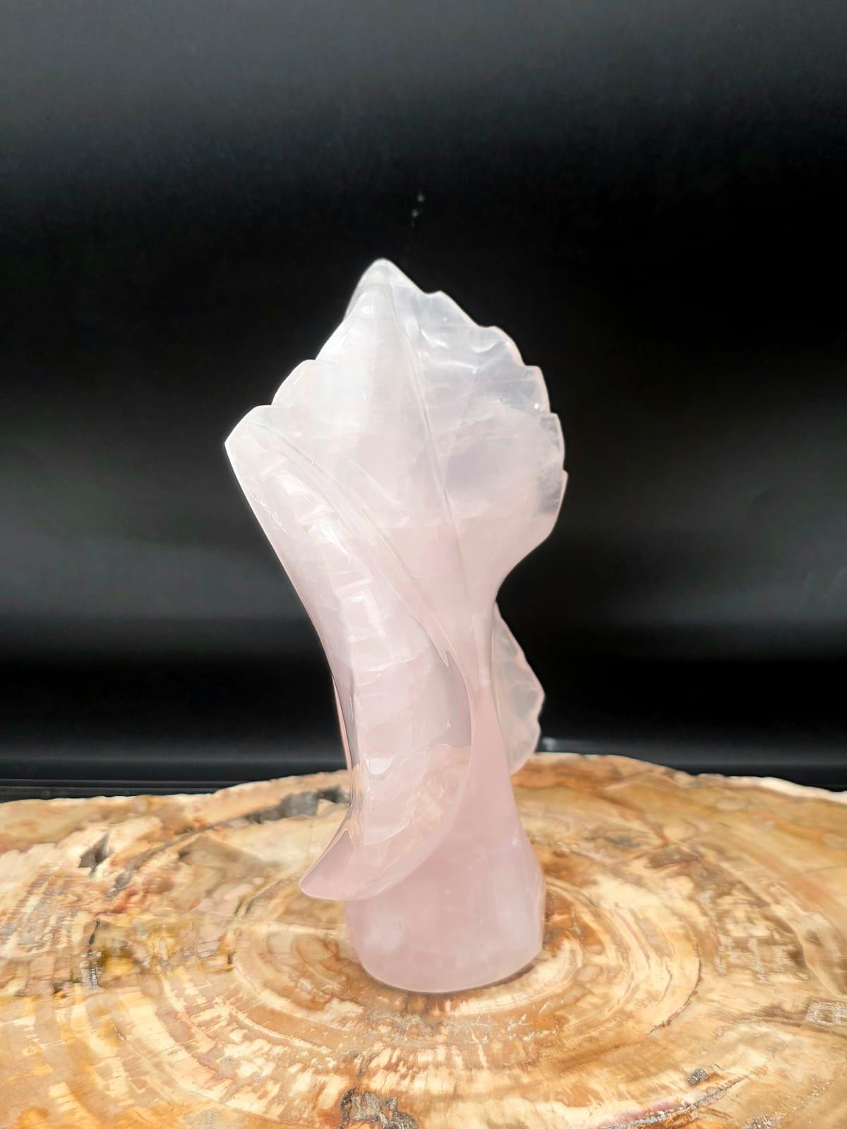 Madagascan Rose Quartz leaf sculpture with polished finish.
