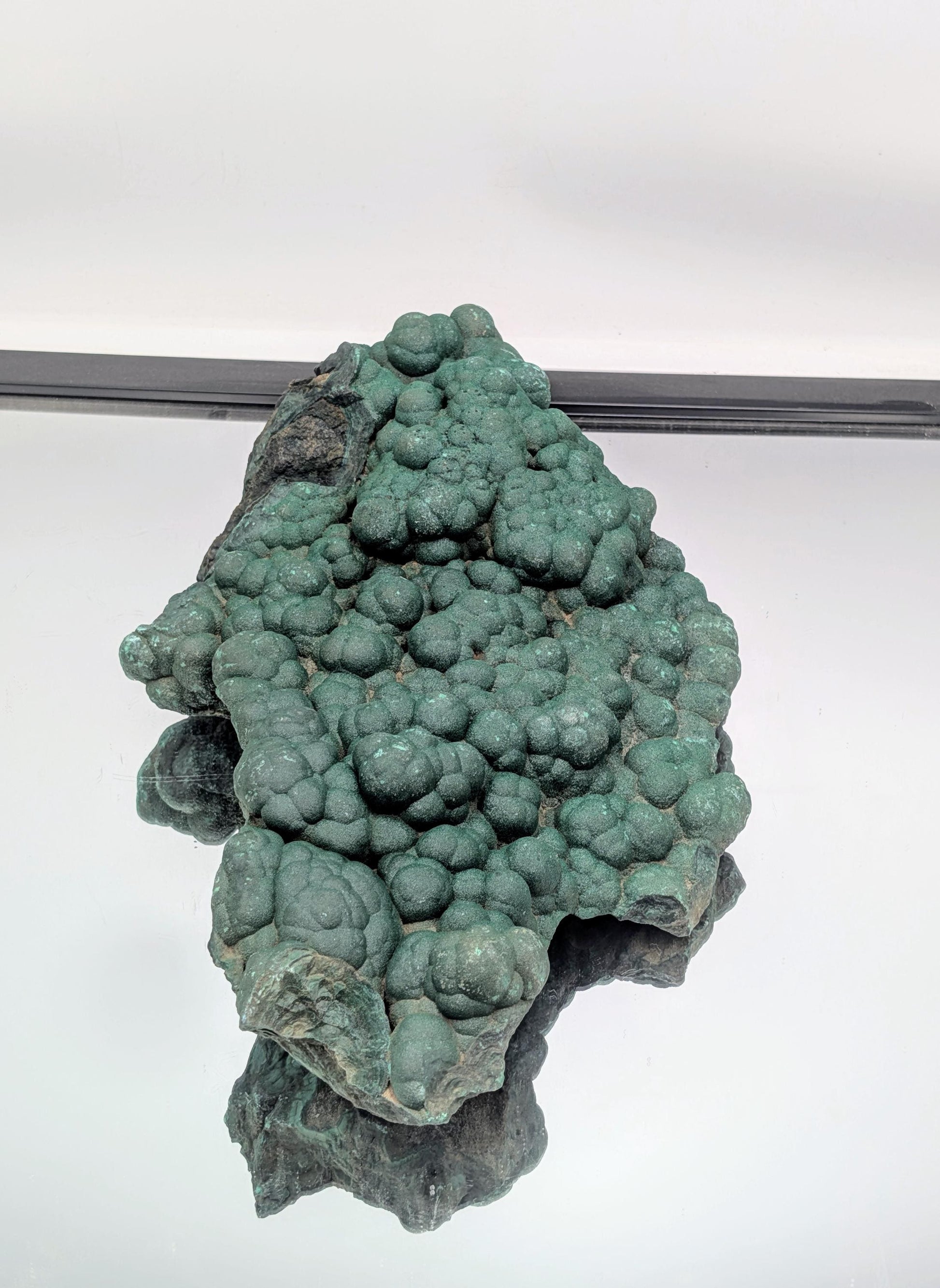 Collector's item: substantial malachite with quartz druzy accents.