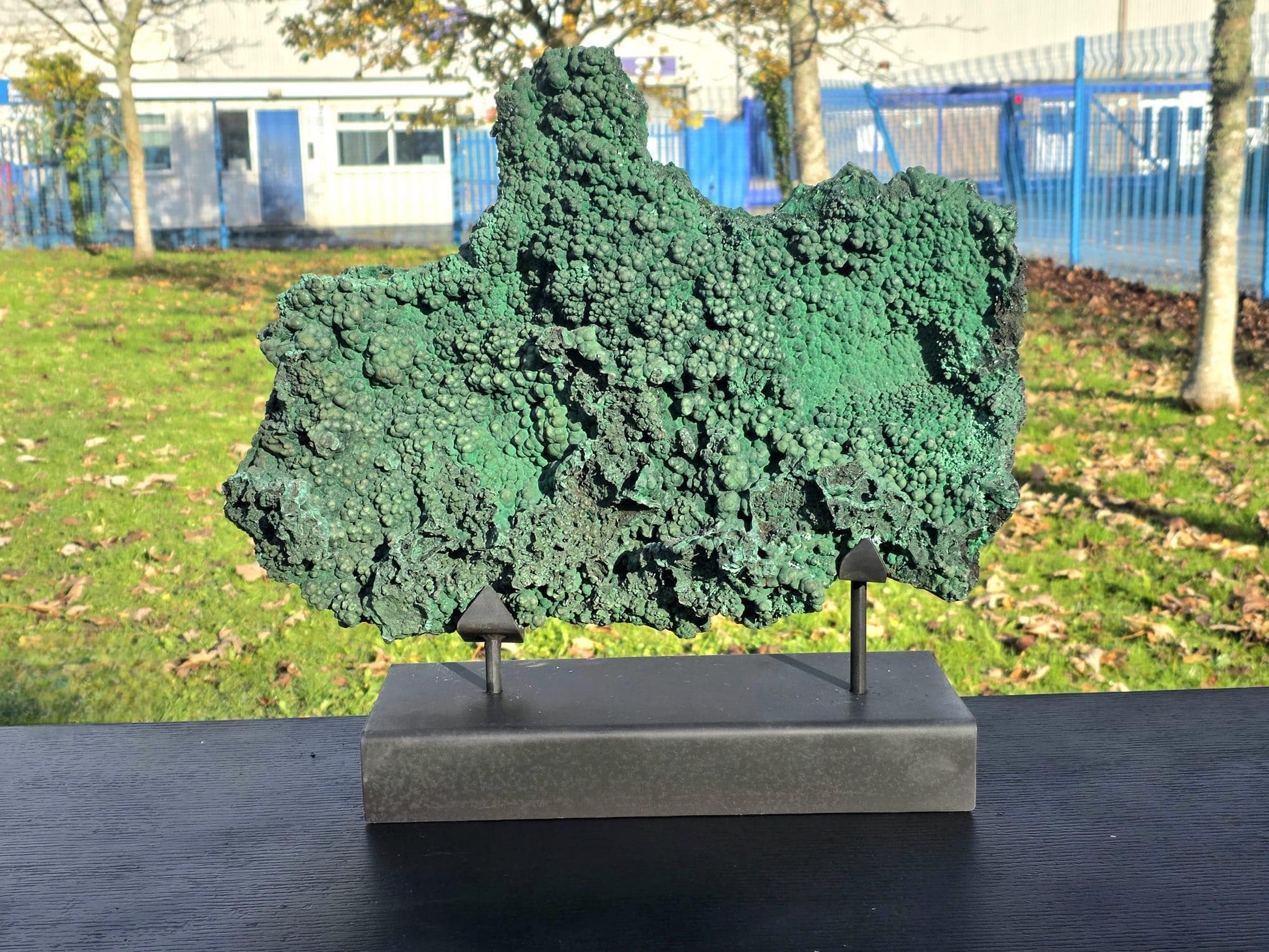 Large Malachite crystal displayed as interior décor