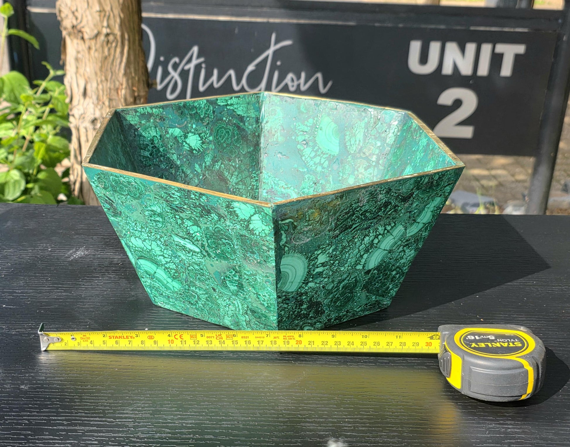 Decorative malachite flower pot crafted from natural crystal slices, perfect for luxury living spaces.