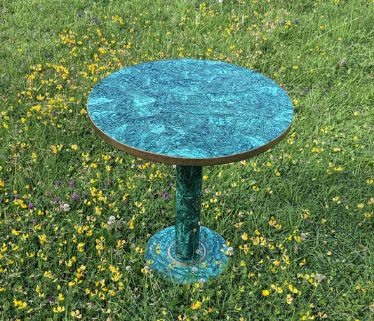 Luxury round malachite crystal inlay table with polished green surface and brass trim for statement interiors.